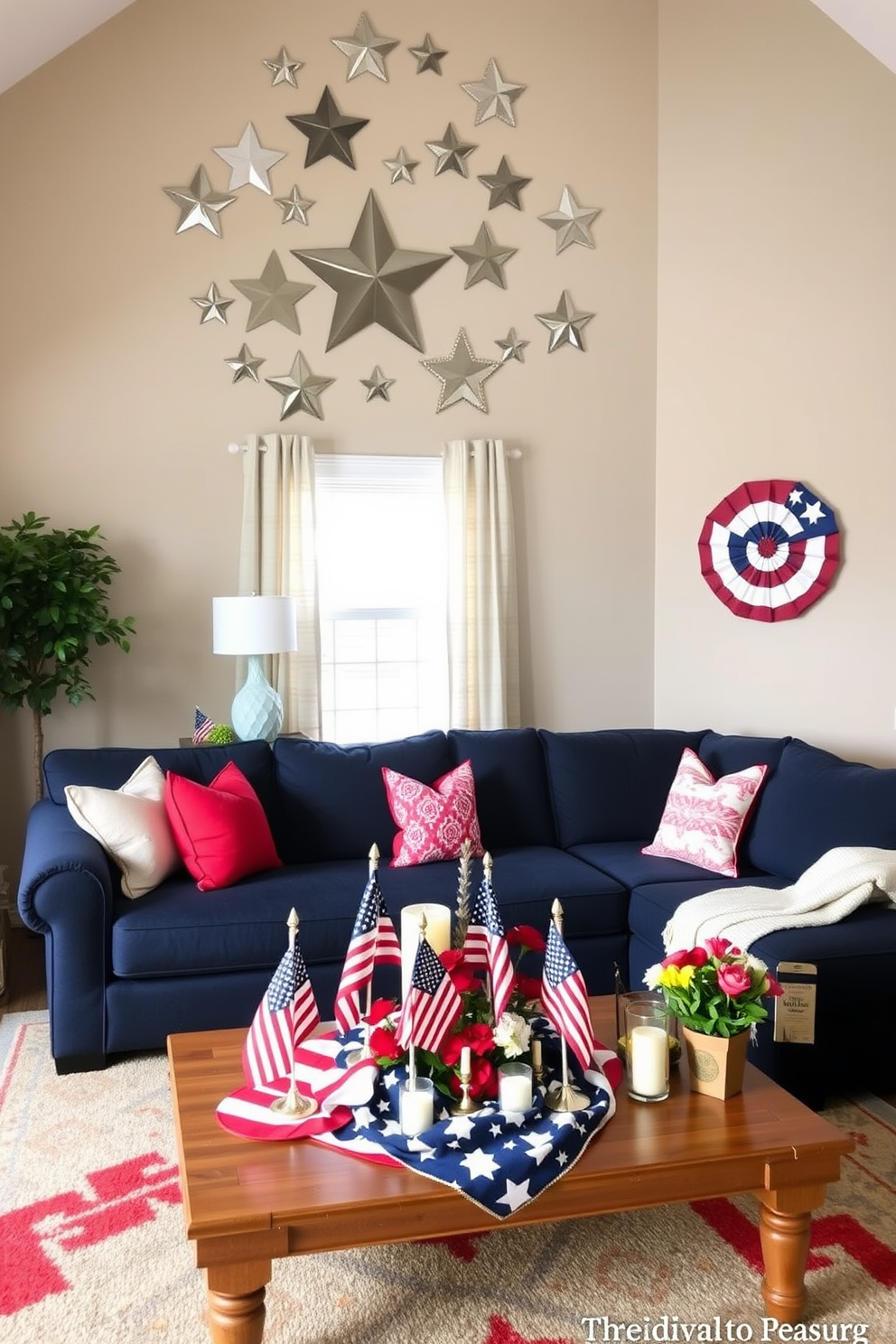 A cozy living room adorned with Memorial Day decorations. The space features a large, comfortable sectional sofa in a deep navy blue, accented with red and white throw pillows. Above the sofa, a series of star-shaped wall mirrors in varying sizes create a striking focal point. The coffee table in front of the sofa is decorated with a patriotic centerpiece, consisting of small American flags, candles, and fresh flowers in red, white, and blue hues.