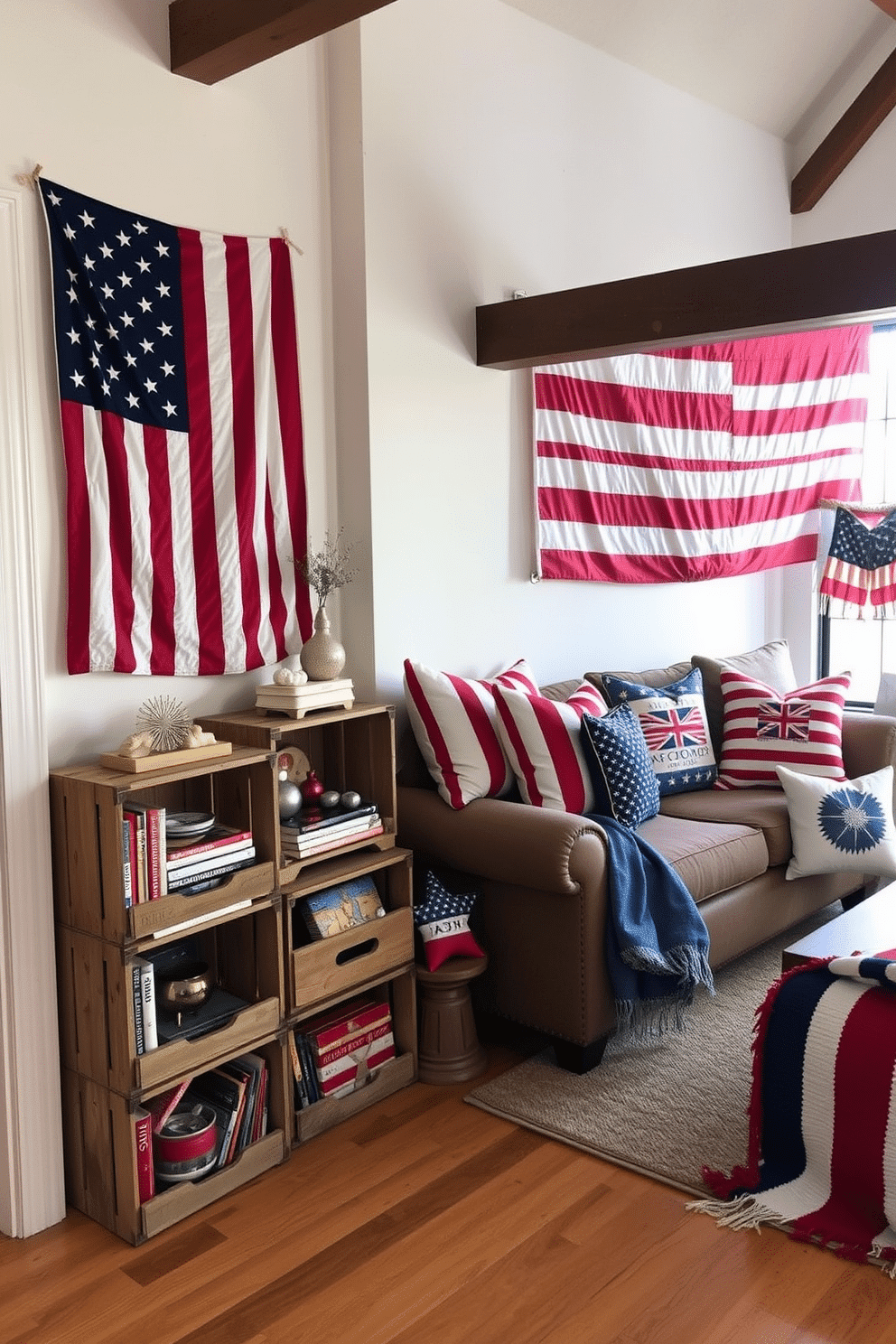 A collection of vintage wooden crates is stacked in a cozy corner, serving as rustic storage for books and decorative items. The natural wood tones complement the warm lighting of the room, creating an inviting atmosphere. The loft is adorned with patriotic decor for Memorial Day, featuring red, white, and blue accents throughout the space. A large American flag hangs on the wall, while festive cushions and throws add a touch of seasonal charm.