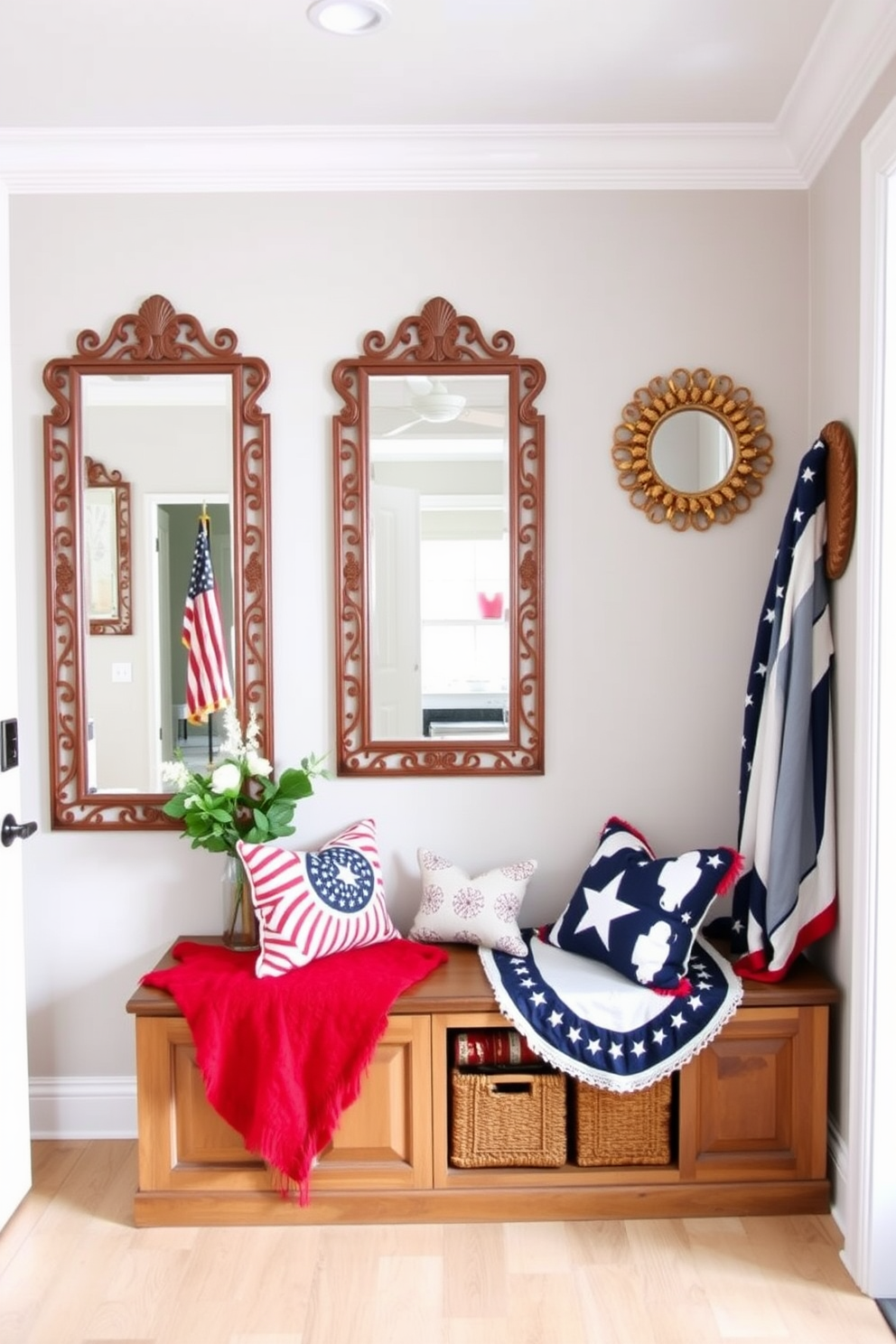 A stylish mudroom featuring wall mirrors with decorative frames. The mirrors are elegantly designed, reflecting natural light and enhancing the space's openness. The mudroom is adorned with patriotic decor for Memorial Day, incorporating red, white, and blue accents. A cozy bench with storage underneath complements the vibrant theme, creating a welcoming entrance.