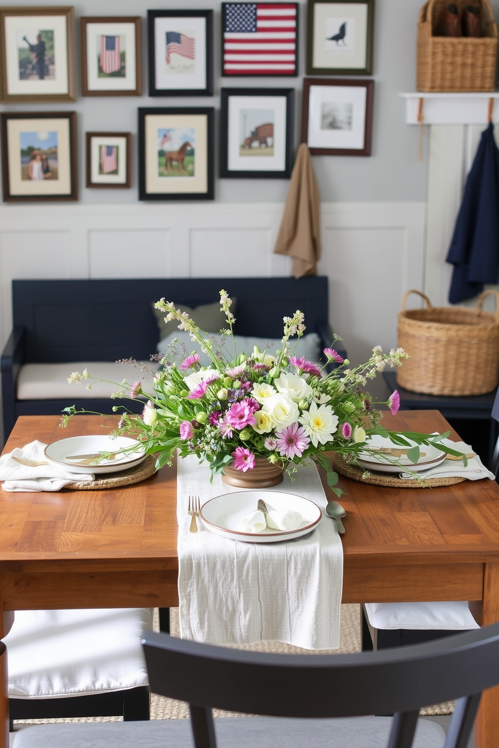 Seasonal table decorations with natural elements. A rustic wooden table is adorned with a centerpiece of fresh wildflowers and greenery, complemented by handmade ceramic plates and linen napkins. Memorial Day Mudroom Decorating Ideas. The mudroom features a navy blue bench with white cushions, accented by a gallery wall of framed patriotic art and a woven basket for storing shoes.