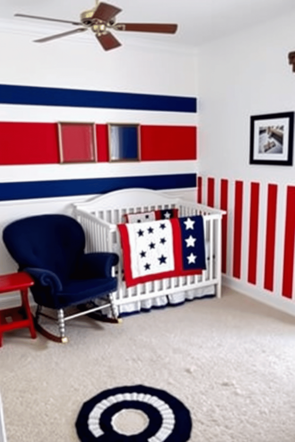 A charming nursery decorated in a patriotic red white and blue color scheme. The walls are painted in a soft white with one accent wall featuring bold red and blue stripes. A cozy crib is centered in the room, adorned with a quilt that showcases stars and stripes. A plush rocking chair in navy blue sits in the corner, complemented by a small side table painted in bright red.