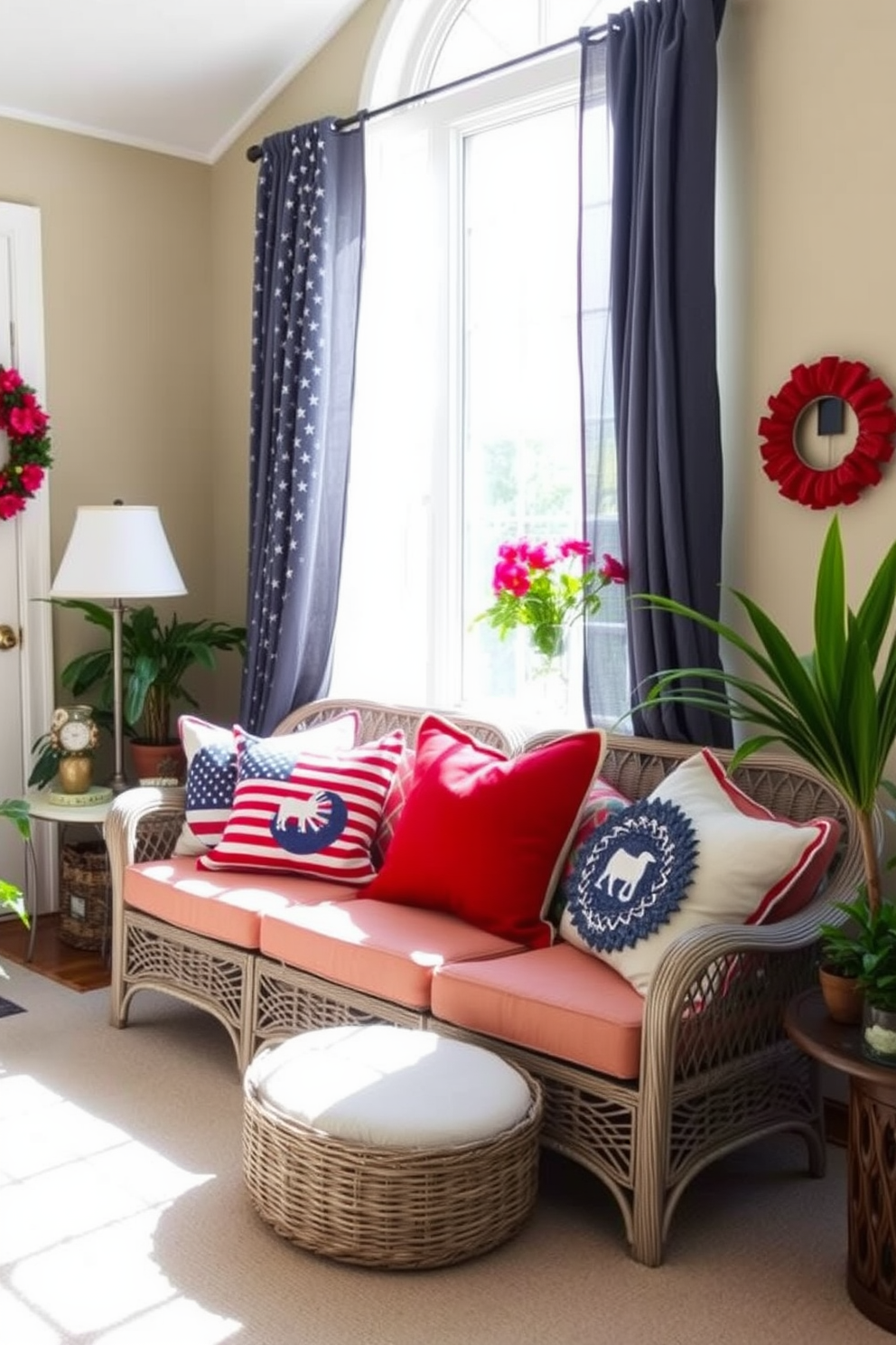 A sunroom decorated for Memorial Day features a cozy seating area adorned with patriotic red white and blue pillows. The bright natural light filters through sheer curtains, highlighting the cheerful colors and creating an inviting atmosphere.