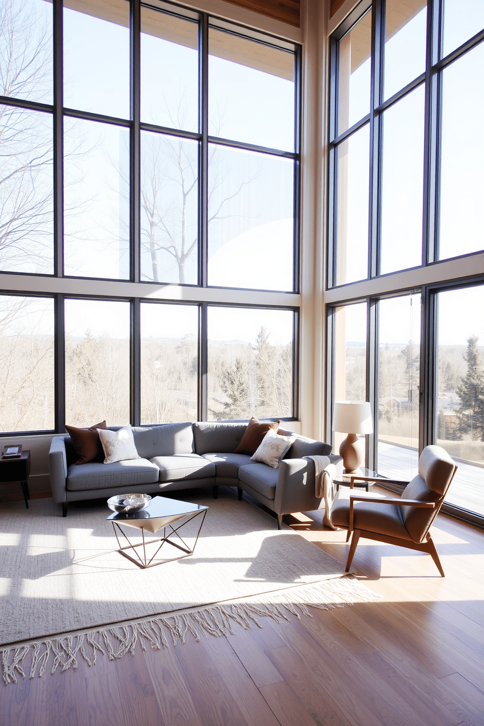 A spacious family room featuring floor-to-ceiling windows that flood the space with natural light. The room is designed in a Mid-Century Modern style, showcasing a sleek, low-profile sofa in a muted color, paired with a geometric coffee table and a retro accent chair.