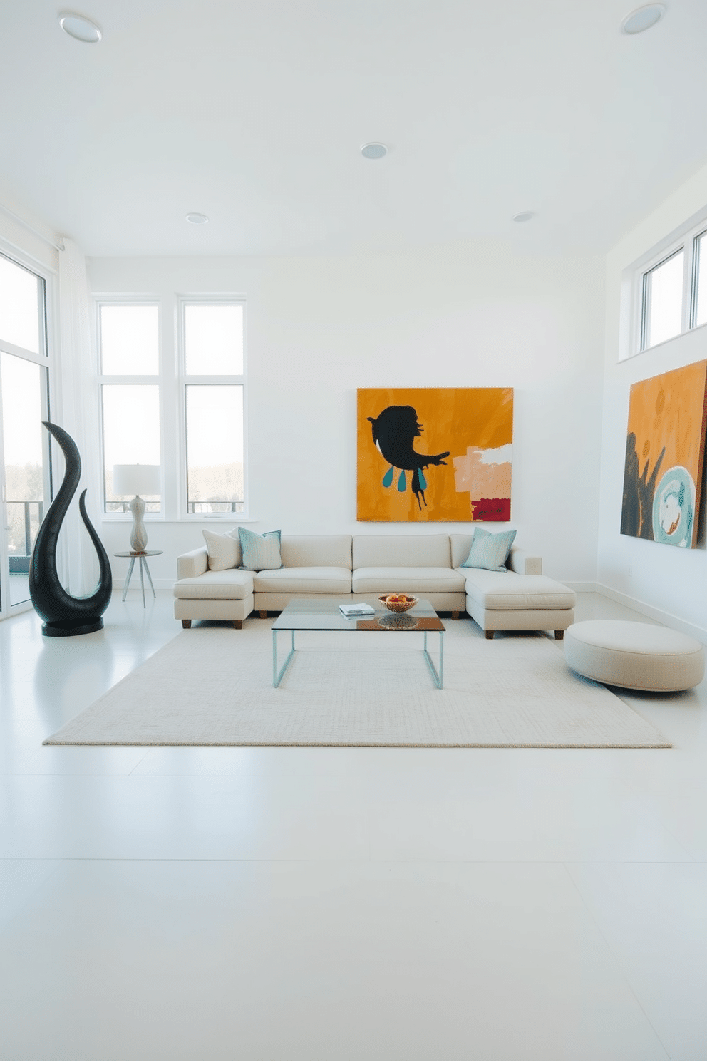 A minimalist family room features a spacious layout with light-colored walls and a soft beige area rug that anchors the space. In the center, a low-profile sectional sofa in a neutral tone is complemented by a sleek glass coffee table, creating an inviting atmosphere. Artistic statement pieces are strategically placed on the floor, including a large abstract sculpture in the corner and a vibrant, oversized painting on the wall. Natural light floods the room through expansive windows, highlighting the simplicity and elegance of the design.