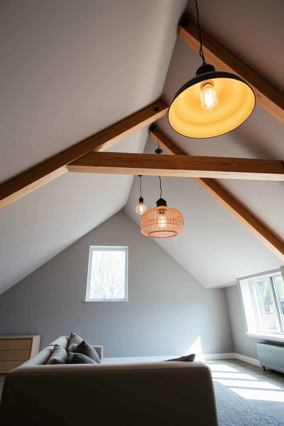 A stunning modern attic space featuring creative lighting fixtures as focal points. The ceiling is adorned with unique pendant lights that cast a warm glow, enhancing the cozy ambiance of the room. The walls are painted in soft gray tones, complemented by exposed wooden beams that add character. A plush seating area with a contemporary sofa faces a large window, allowing natural light to flood the space and highlight the artistic light fixtures.