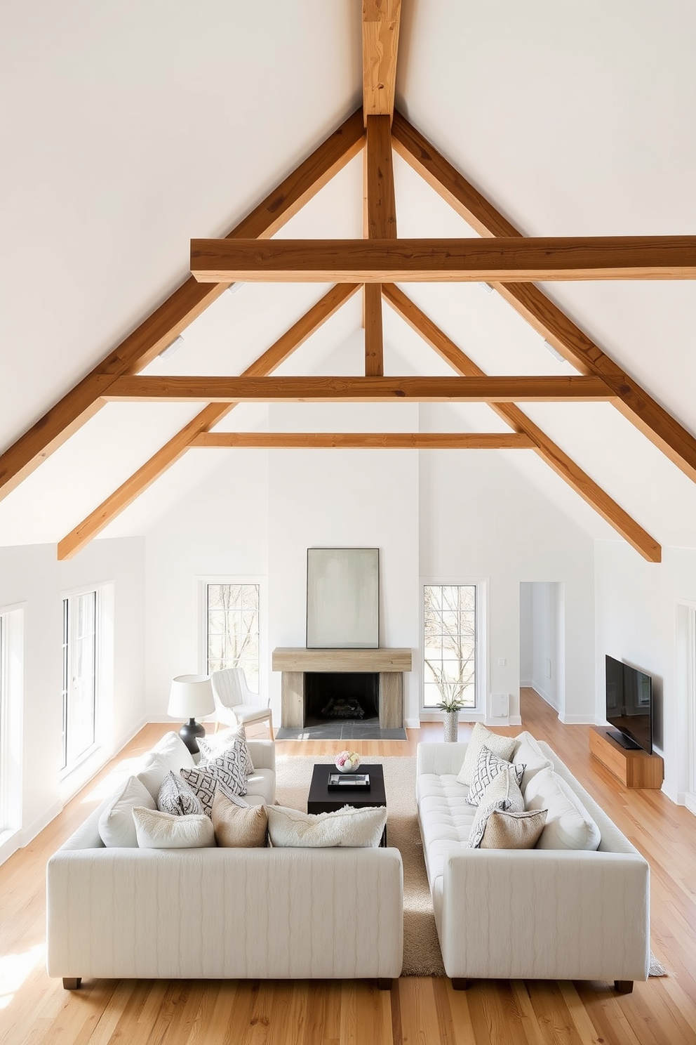 Bright white walls with exposed wooden beams create a stunning contrast in this modern attic space. The open layout features a cozy seating area with plush furniture, accentuated by large windows that flood the room with natural light.