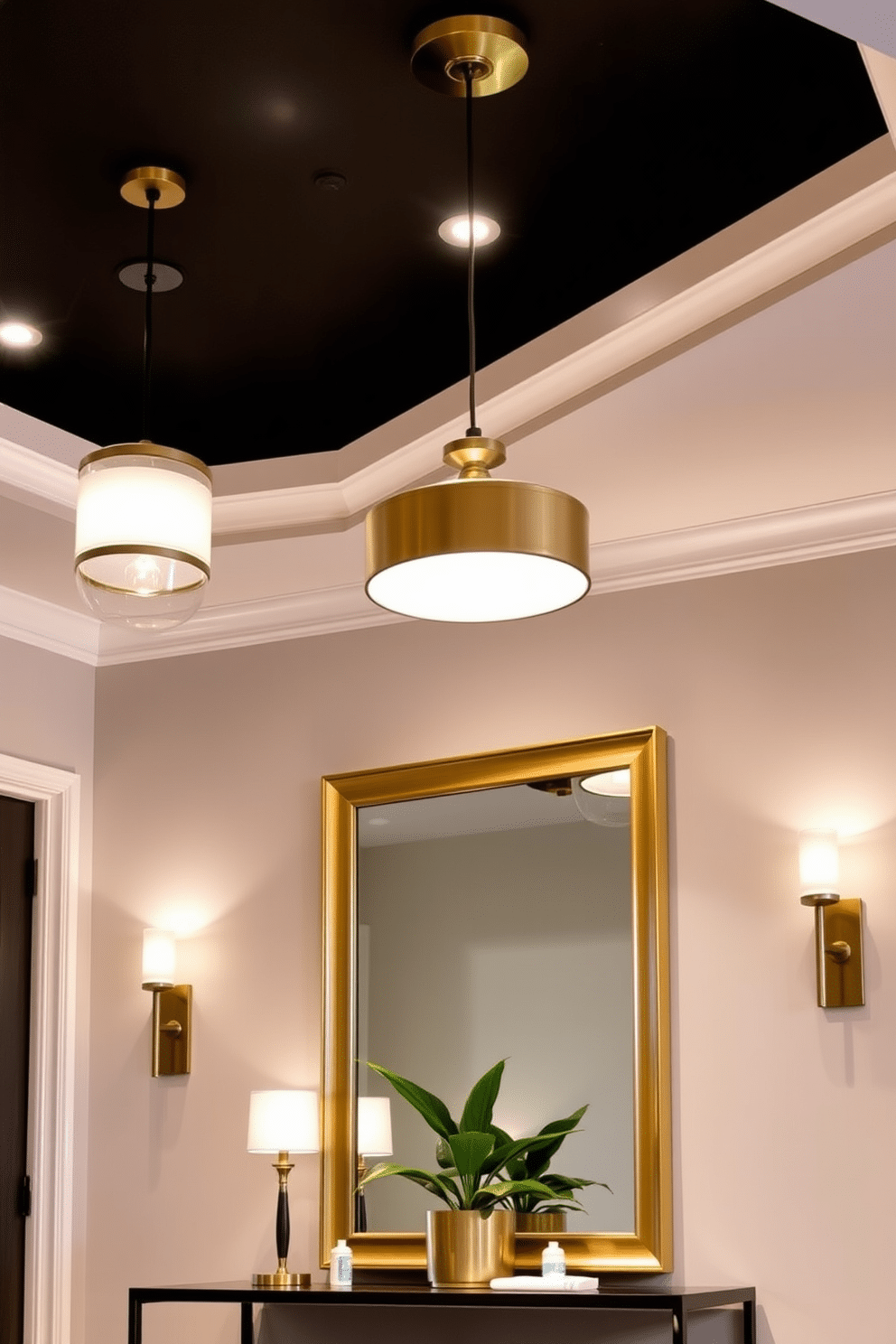 A modern entryway features layered lighting to create a warm and inviting atmosphere. Recessed ceiling lights provide general illumination, while stylish pendant fixtures hang above a sleek console table, enhancing both function and aesthetics. The entryway is adorned with a statement mirror framed in brushed brass, reflecting light and adding depth to the space. A combination of wall sconces on either side of the mirror offers additional lighting, highlighting a curated selection of decorative items and a vibrant potted plant.