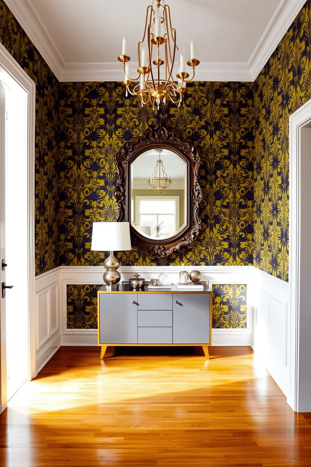 A striking entryway featuring bold, patterned wallpaper that creates a dramatic focal point. The space is illuminated by a stylish chandelier, and a sleek console table with decorative accents sits against the wall. The flooring is a polished hardwood that contrasts beautifully with the vibrant wallpaper. A large, ornate mirror hangs above the console, reflecting the light and enhancing the sense of space.