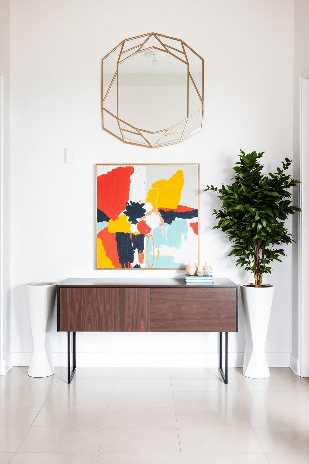 A modern entryway features a sleek console table made of dark wood, topped with a vibrant abstract painting that draws the eye. Flanking the table are two tall, sculptural planters filled with lush greenery, adding a touch of nature to the space. The walls are painted in a crisp white, providing a clean backdrop that enhances the bold art pieces. A contemporary mirror with a geometric frame hangs above the console, reflecting the light and creating a sense of openness.