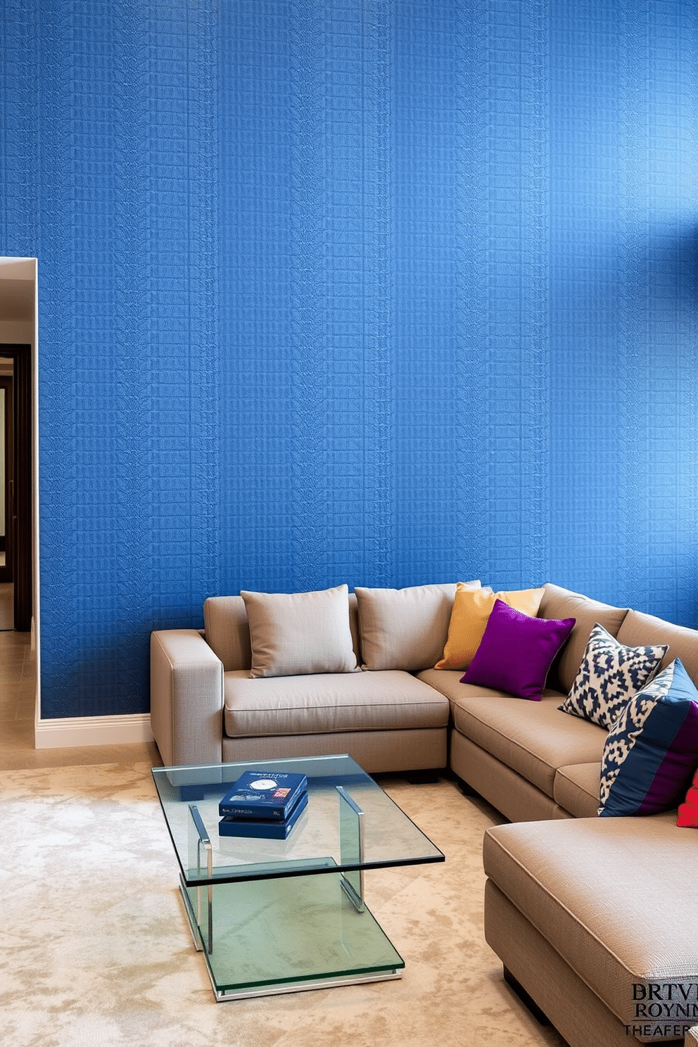 Accent wall with textured wallpaper. The wall features a luxurious, deep blue wallpaper with a subtle geometric pattern that adds depth and interest to the space. Modern family room design ideas. The room includes a large sectional sofa in a neutral fabric, paired with a sleek glass coffee table and vibrant accent pillows for a pop of color.