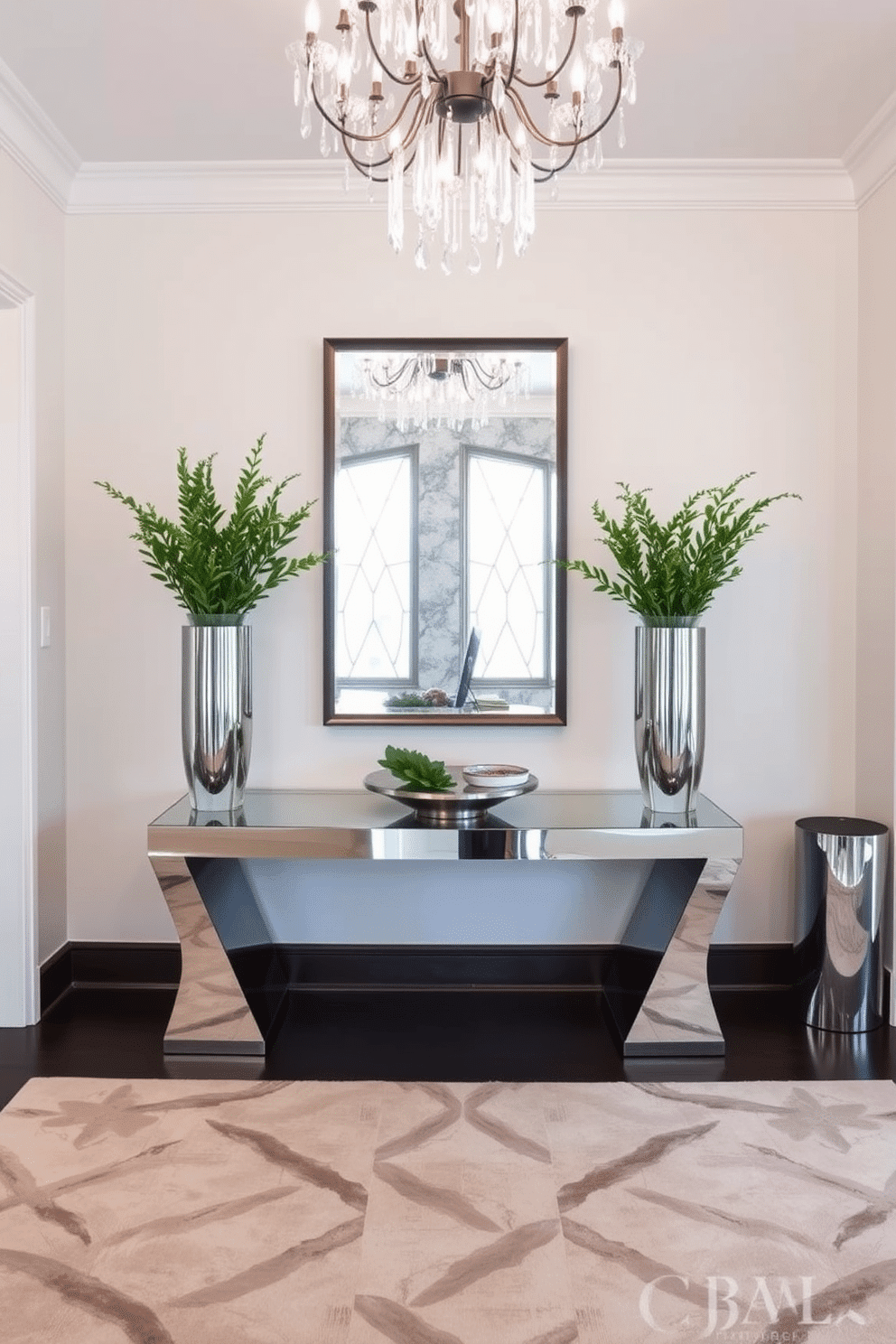 A modern foyer featuring mirrored furniture that enhances the sense of space and light. The design includes a sleek mirrored console table with elegant lines, flanked by tall, reflective vases filled with fresh greenery. The walls are painted in a soft, neutral hue to complement the furniture, while a stylish area rug adds warmth underfoot. A statement chandelier hangs from the ceiling, casting a beautiful glow throughout the entrance.