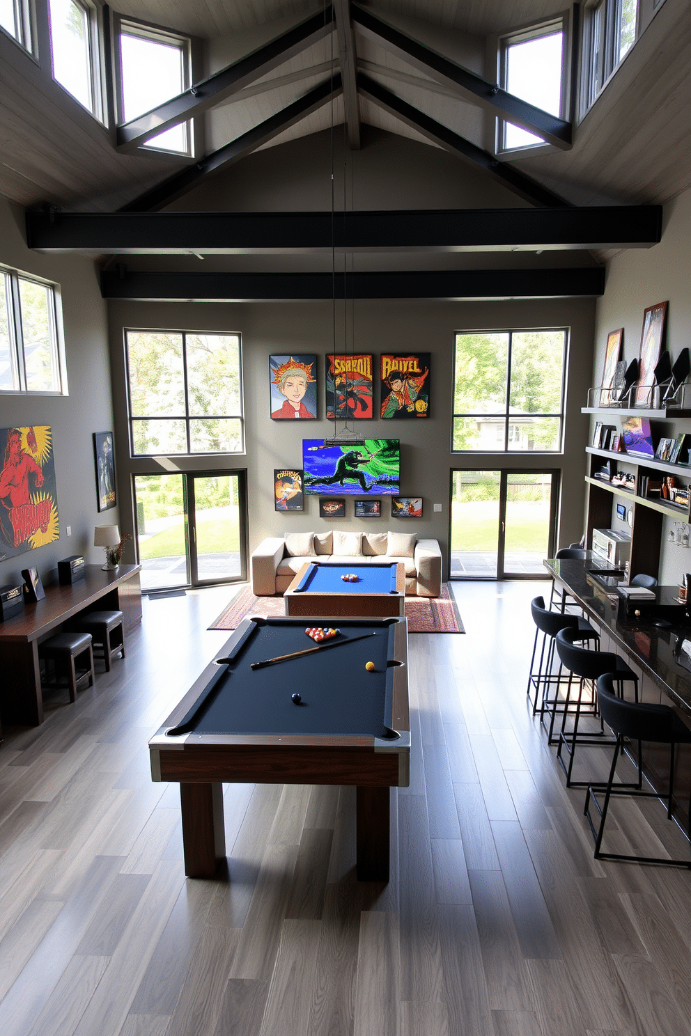 A modern game room designed for spaciousness features an open floor plan that seamlessly integrates entertainment and relaxation areas. The room is filled with natural light from large windows, highlighting a sleek pool table and a cozy lounge area with sectional sofas. The walls are adorned with vibrant artwork and shelves displaying gaming memorabilia, creating an inviting atmosphere. A stylish bar counter with high stools sits in one corner, providing a perfect spot for refreshments during game nights.