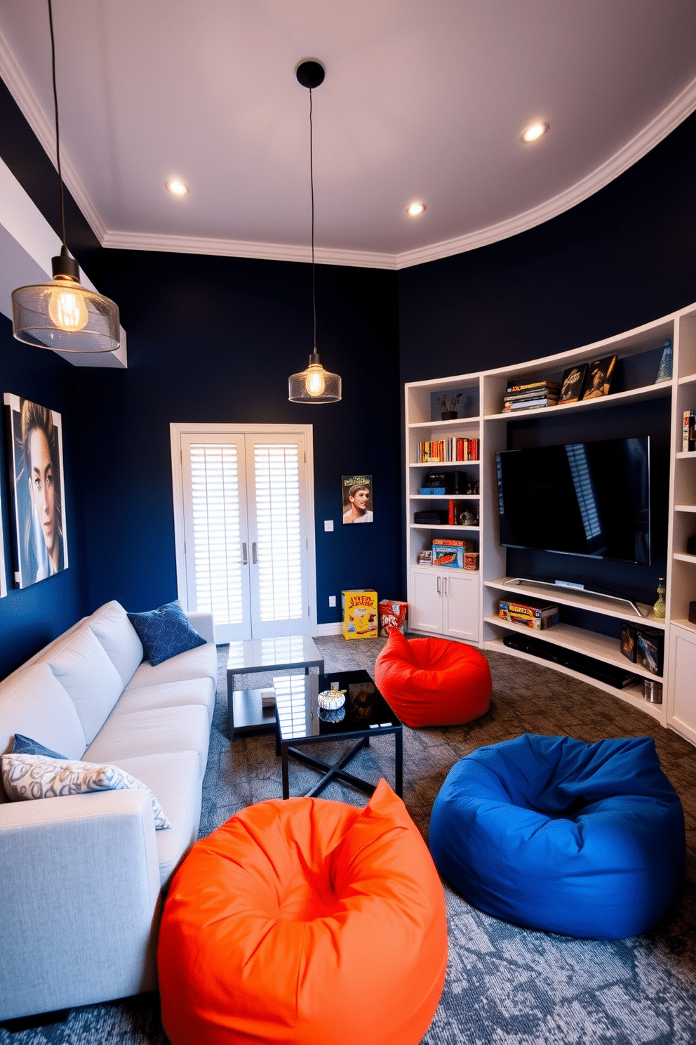 A modern game room featuring an accent wall painted in a deep navy blue, creating a striking focal point. The room is furnished with a sleek sectional sofa in a light gray fabric, paired with a glass coffee table and vibrant, oversized bean bags for added comfort. The space is illuminated by stylish pendant lights, casting a warm glow over the gaming area. A large flat-screen TV is mounted on the opposite wall, surrounded by shelves filled with games and collectibles, enhancing the room's playful atmosphere.