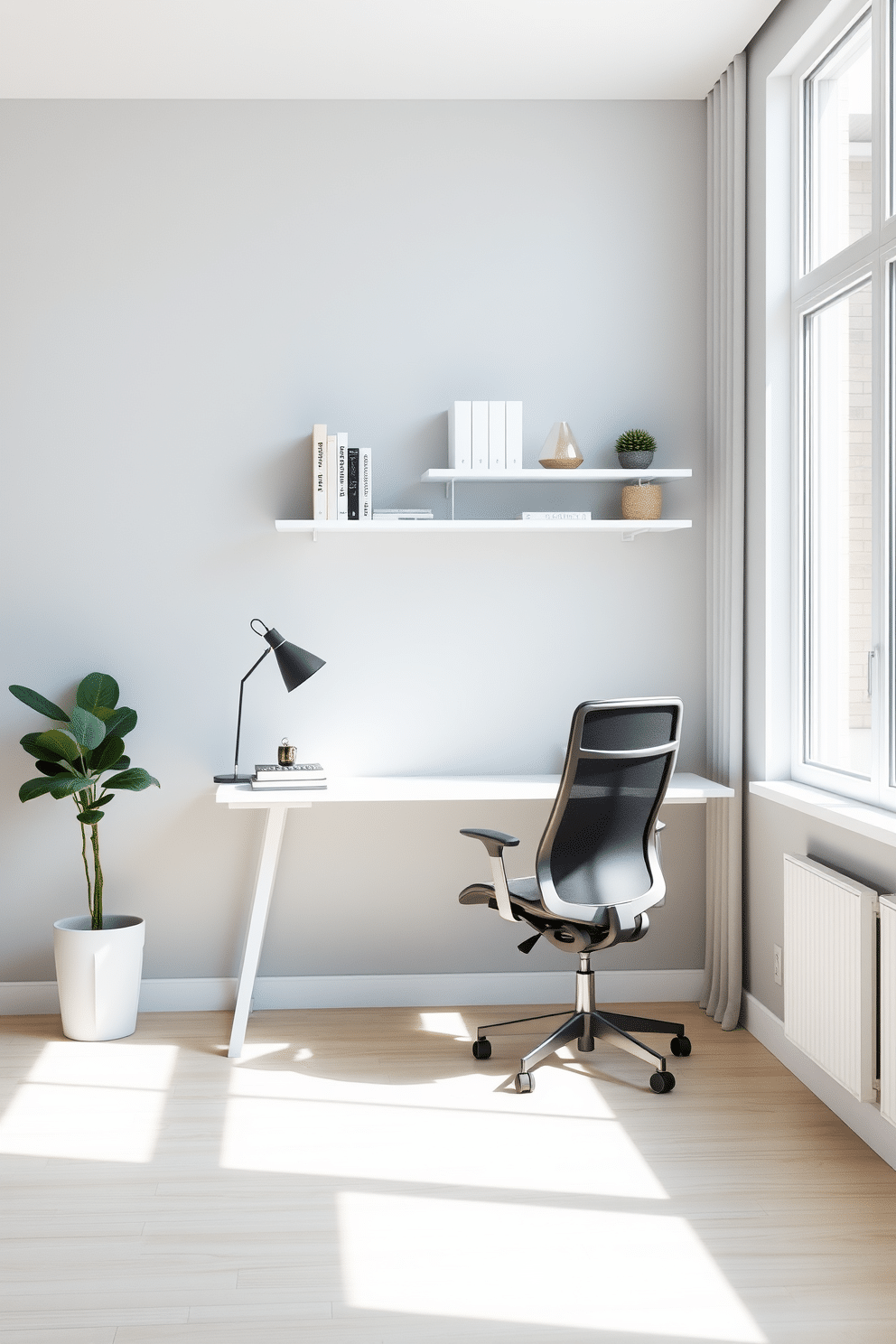 A minimalist home office featuring a sleek, white desk positioned against a soft gray wall. The decor includes a comfortable ergonomic chair, a small potted plant, and a wall-mounted shelf with neatly arranged books and decorative items. The color palette consists of muted tones like pale blue and soft beige, creating a calming atmosphere. Large windows allow natural light to flood the space, enhancing the serene vibe of the office.