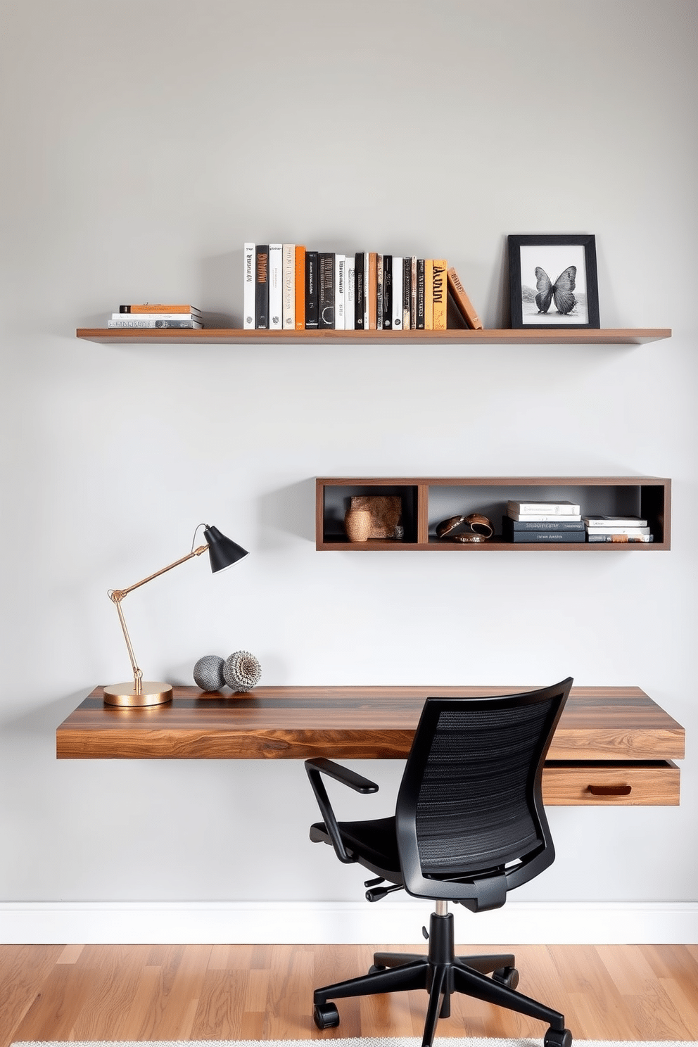 A modern home office features sleek floating shelves mounted on a light gray wall, providing organized storage for books and decorative items. A stylish desk made of reclaimed wood sits beneath the shelves, accompanied by a comfortable ergonomic chair and a minimalist desk lamp.