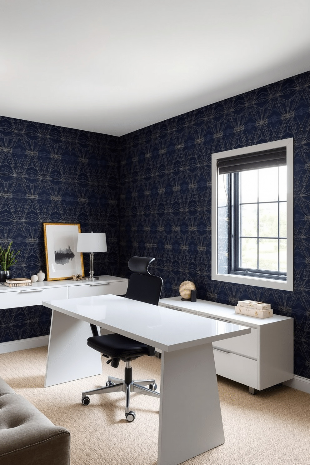 A stylish accent wall featuring intricate geometric wallpaper in shades of navy and gold. The wall serves as a stunning backdrop for a sleek desk and a comfortable ergonomic chair, creating a focal point in the room. Modern home office design ideas incorporate a minimalist aesthetic with clean lines and functional furniture. A large window allows natural light to flood the space, complemented by a neutral color palette and stylish decorative elements.