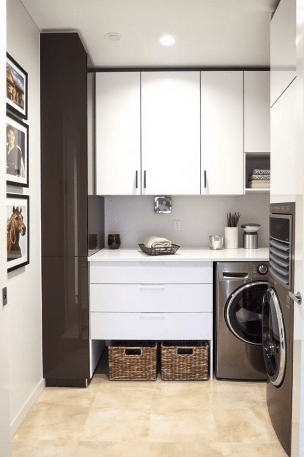 A modern laundry room featuring sleek cabinetry with a glossy finish and integrated appliances. The walls are adorned with personalized art prints that reflect the homeowner's style, adding a unique touch to the space. The flooring consists of large, light-colored tiles that are both functional and stylish, enhancing the room's brightness. A spacious countertop provides ample workspace for folding clothes, while decorative baskets neatly organize laundry essentials.