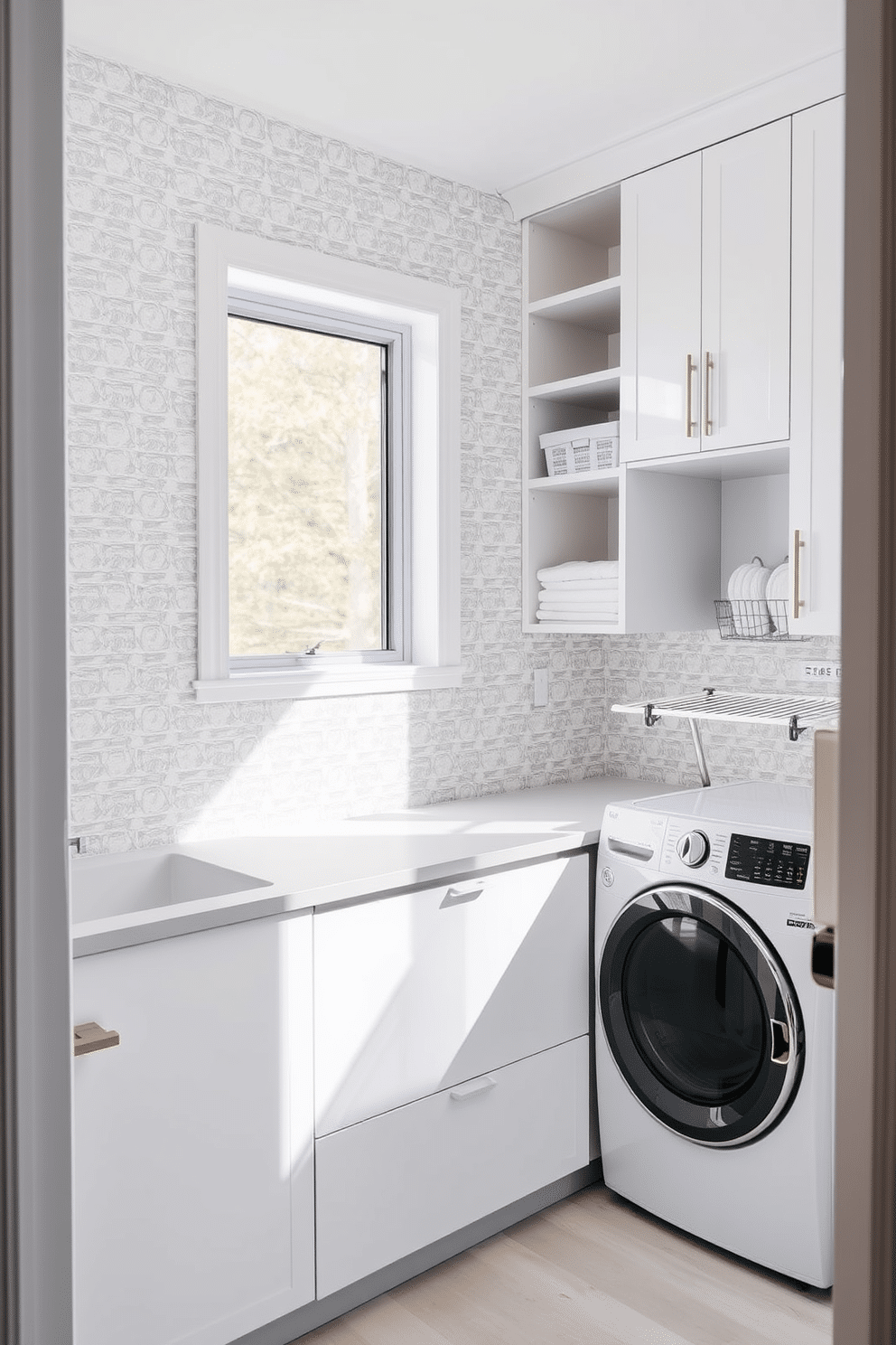 A modern laundry room features a textured tile backsplash that adds visual interest and depth to the space. The cabinetry is sleek and minimalist, with a combination of open shelves and closed storage for a tidy appearance. The room is illuminated by natural light streaming through a window, showcasing the soft color palette of whites and grays. Functional elements like a spacious countertop for folding clothes and a stylish drying rack enhance both practicality and aesthetics.