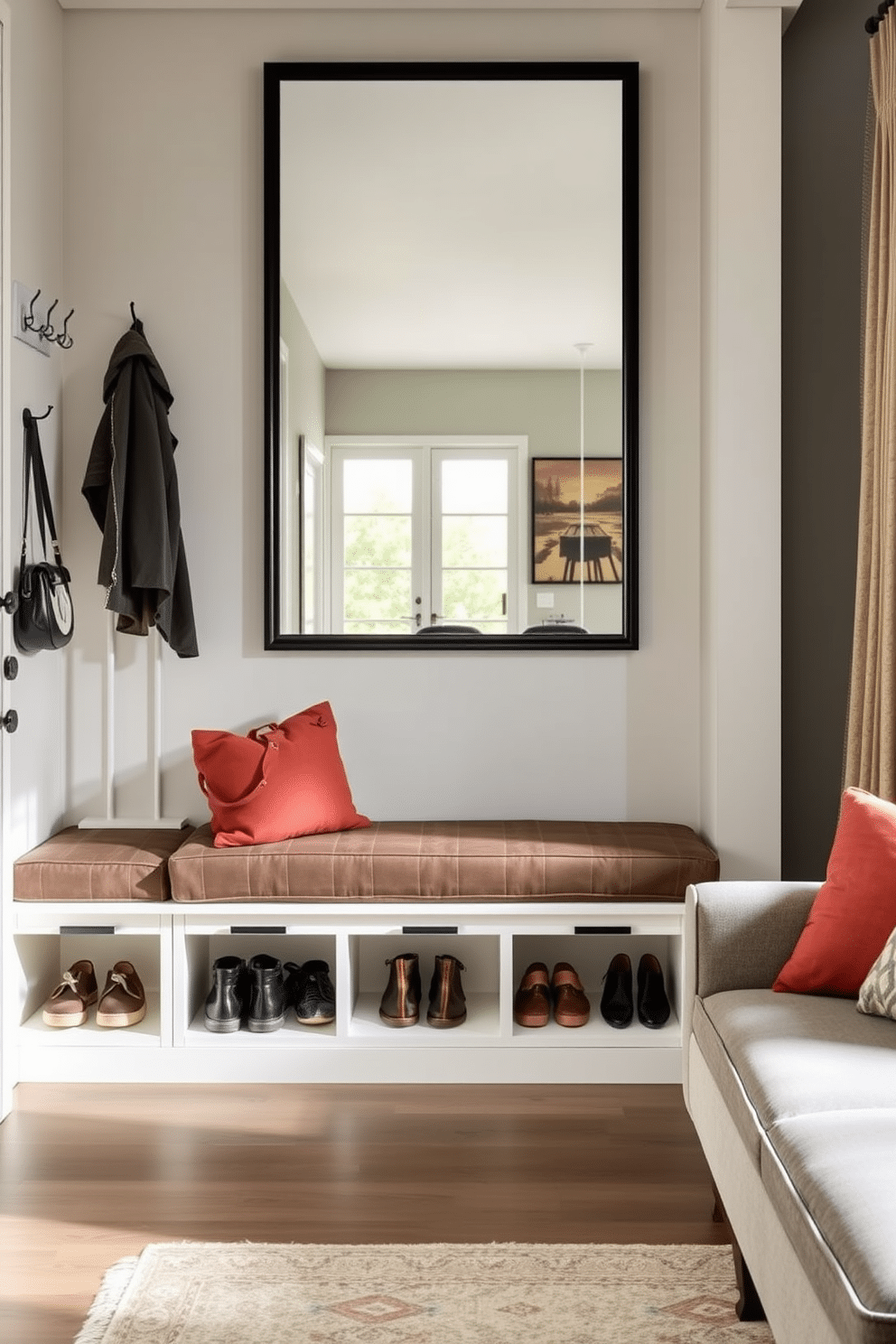 A stylish mudroom features a built-in bench with storage cubbies beneath, perfect for shoes and bags. The walls are adorned with hooks for coats, and a large mirror reflects natural light, enhancing the space's functionality. Incorporating multi-functional furniture, such as a coffee table that transforms into a dining table, maximizes versatility in small living areas. A sleek sofa bed offers comfortable seating by day and a cozy sleeping space by night, seamlessly adapting to your needs.