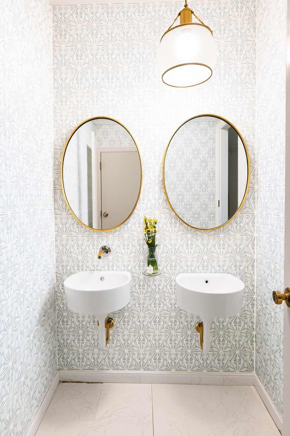 A modern powder room featuring geometric wallpaper in a soft pastel hue, creating a striking visual backdrop. Chic, round mirrors with thin metallic frames are mounted above a sleek, minimalist sink, adding a touch of elegance to the space. The floor is adorned with large, white tiles that contrast beautifully with the wallpaper. A stylish pendant light hangs from the ceiling, illuminating the room and enhancing the modern aesthetic.