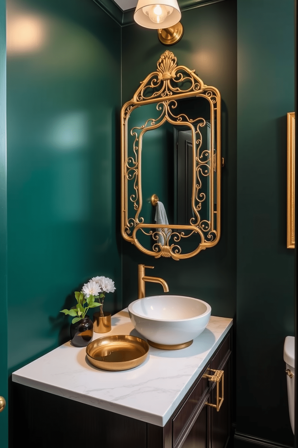 Dark emerald green walls create a rich and inviting atmosphere, complemented by elegant gold accents throughout the space. A sleek, dark wood vanity with a white marble countertop features a stylish vessel sink and a vintage-inspired gold faucet, enhancing the luxurious feel. Soft, ambient lighting casts a warm glow, highlighting the intricate gold-framed mirror above the vanity. Decorative elements, such as a gold-rimmed tray and lush greenery, add a touch of sophistication and freshness to the moody powder room design.