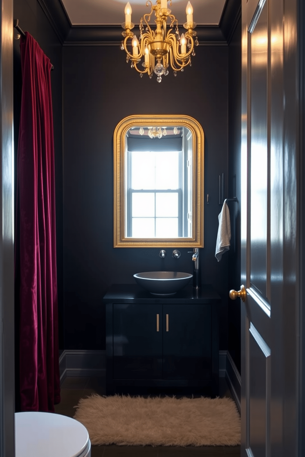 A moody powder room features deep jewel-toned velvet curtains that elegantly frame a small window, adding a touch of luxury and warmth. The walls are painted in a rich, dark hue, complemented by a striking gold-framed mirror above a sleek, dark vanity with a vessel sink. The lighting is soft and ambient, provided by a stylish chandelier that casts a warm glow throughout the room. A plush area rug in a coordinating color lies beneath the vanity, enhancing the cozy, inviting atmosphere of the space.