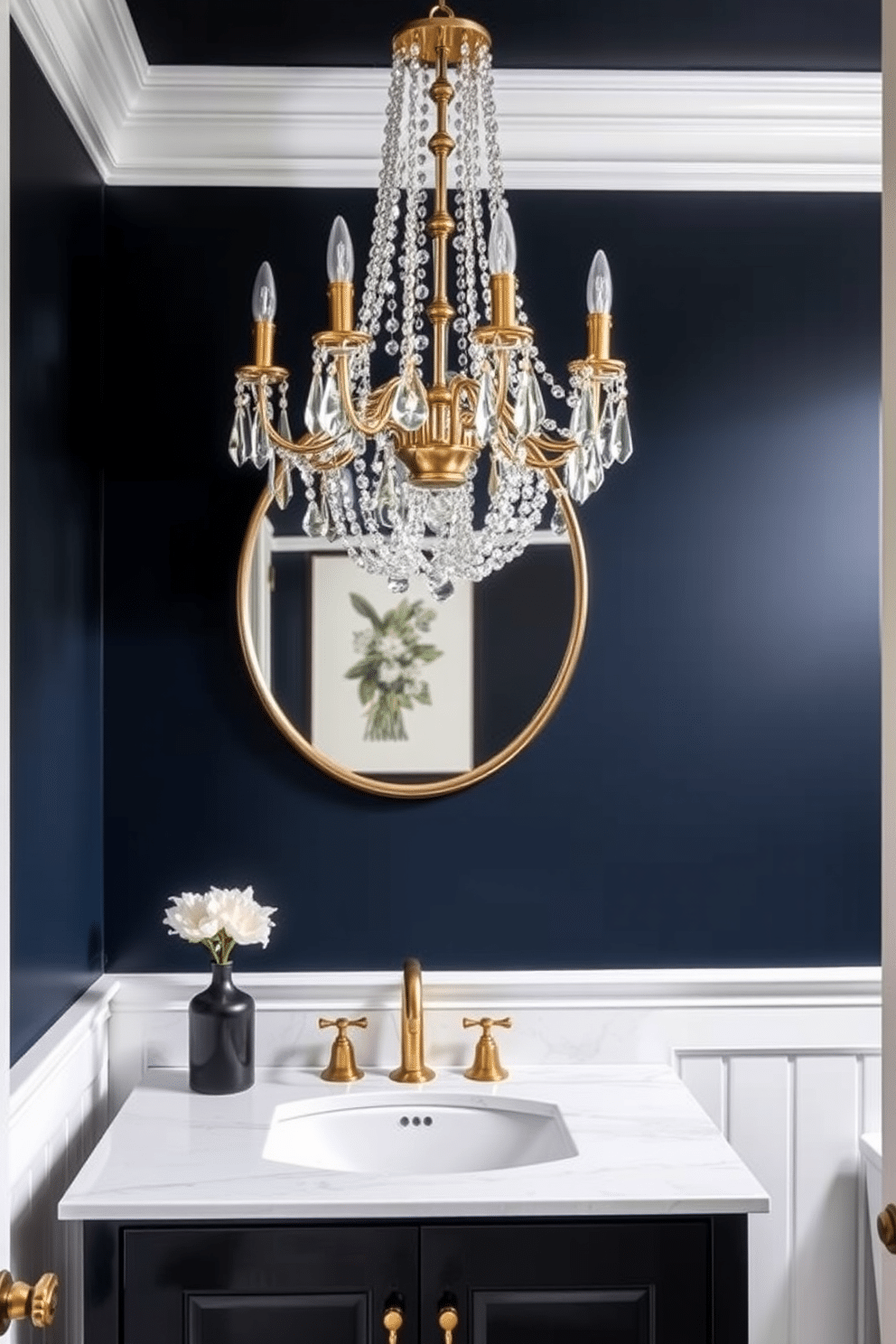 A moody powder room features an elegant chandelier adorned with intricate crystal details, casting a soft, shimmering light throughout the space. The walls are painted in a deep navy blue, complemented by a sleek black vanity with a white marble sink and a stylish gold faucet.