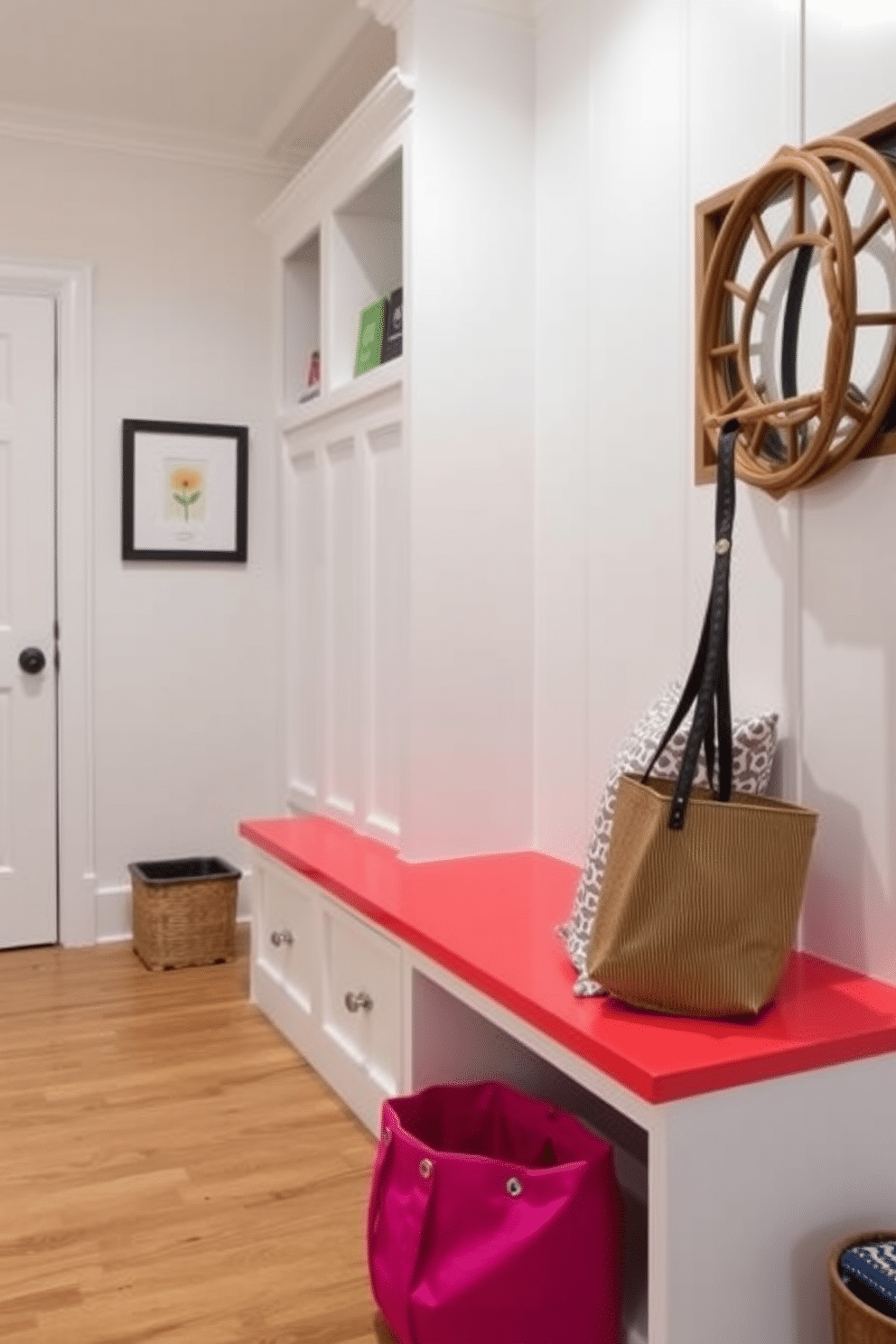 A bright and cheerful mudroom featuring a brightly colored bench with ample storage underneath. The walls are painted in a soft white, creating a fresh backdrop for the vibrant bench, which is adorned with patterned cushions for comfort.