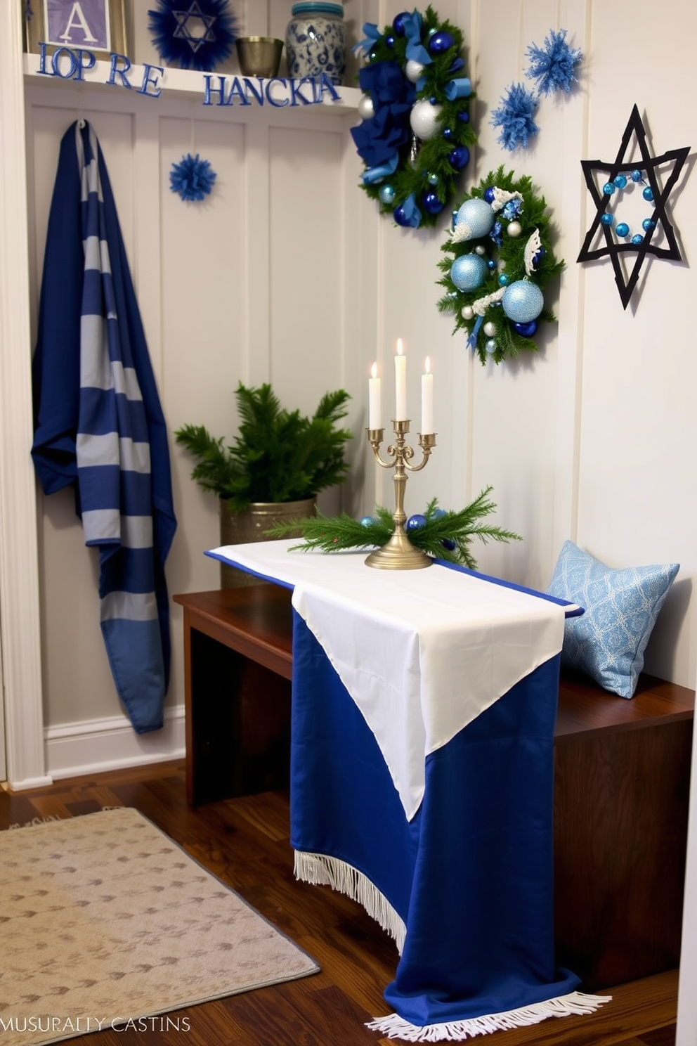 A cozy mudroom decorated for Hanukkah features a blue and white table runner elegantly draped over a wooden bench. The walls are adorned with festive blue and silver decorations, while a small menorah sits atop the table runner, surrounded by candles and seasonal greenery.