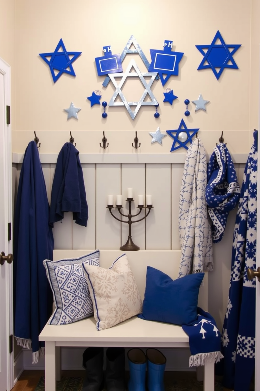 A charming mudroom adorned with Hanukkah-themed coat hooks. The hooks are shaped like dreidels and stars, painted in vibrant blue and silver, creating a festive focal point on the wall. The space features a cozy bench with plush cushions in shades of blue and white, perfect for putting on winter boots. Decorative elements like a menorah and blue-and-white patterned throw blankets add warmth and holiday spirit to the room.