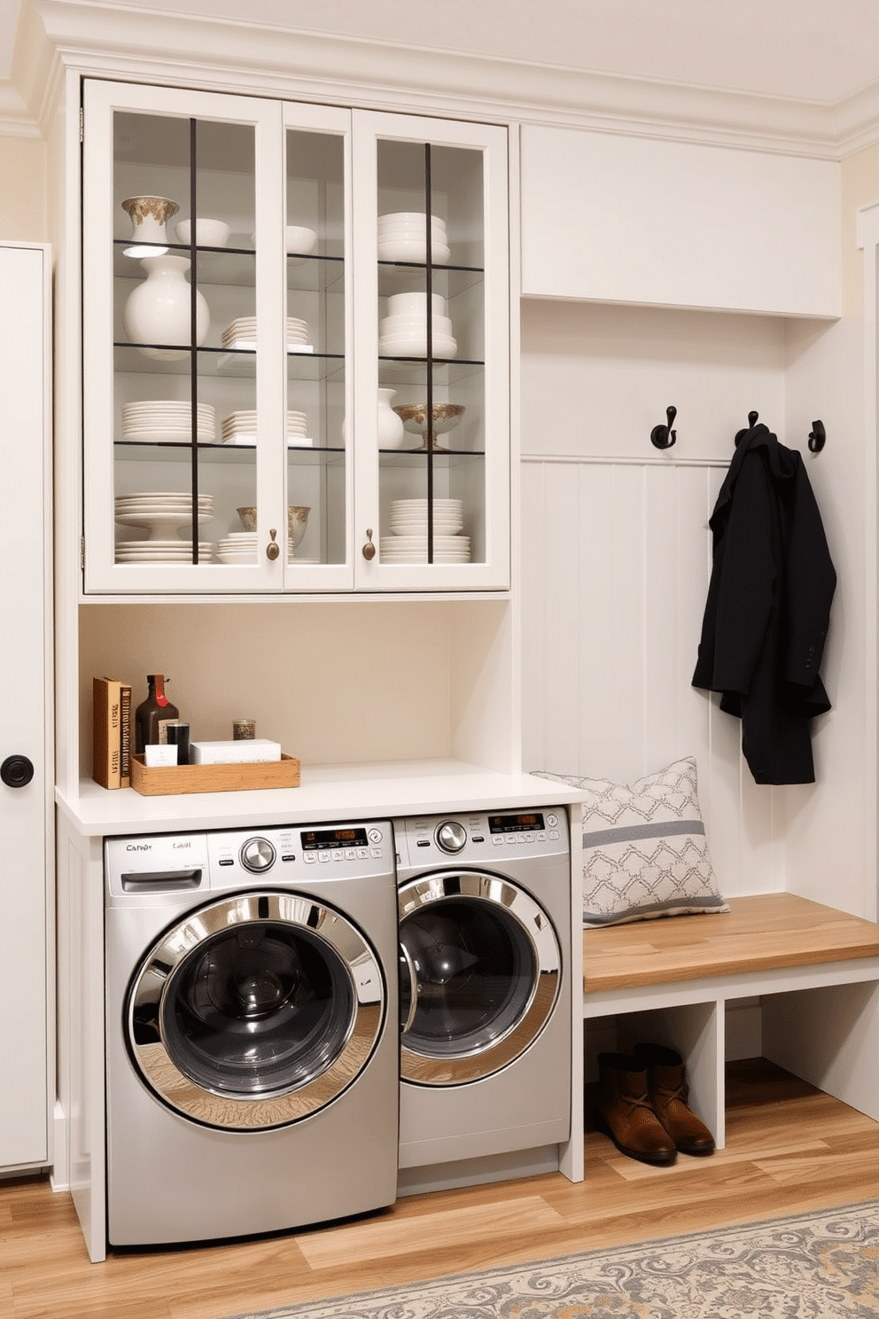 A stylish mudroom laundry room features glass front cabinets that elegantly showcase neatly arranged display items. The space is designed with functional storage solutions, including a built-in bench and hooks for coats, while the walls are adorned with a soft, inviting color palette.