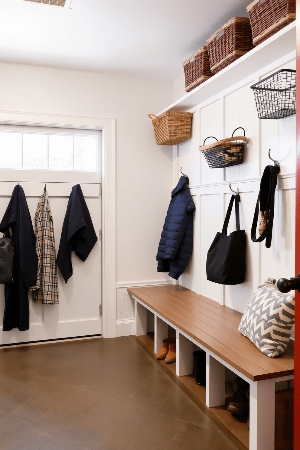 A functional mudroom near the garage features wall-mounted baskets for small items, providing an organized and stylish storage solution. The space is designed with a durable floor, ample hooks for coats, and a bench for easy seating while putting on shoes.