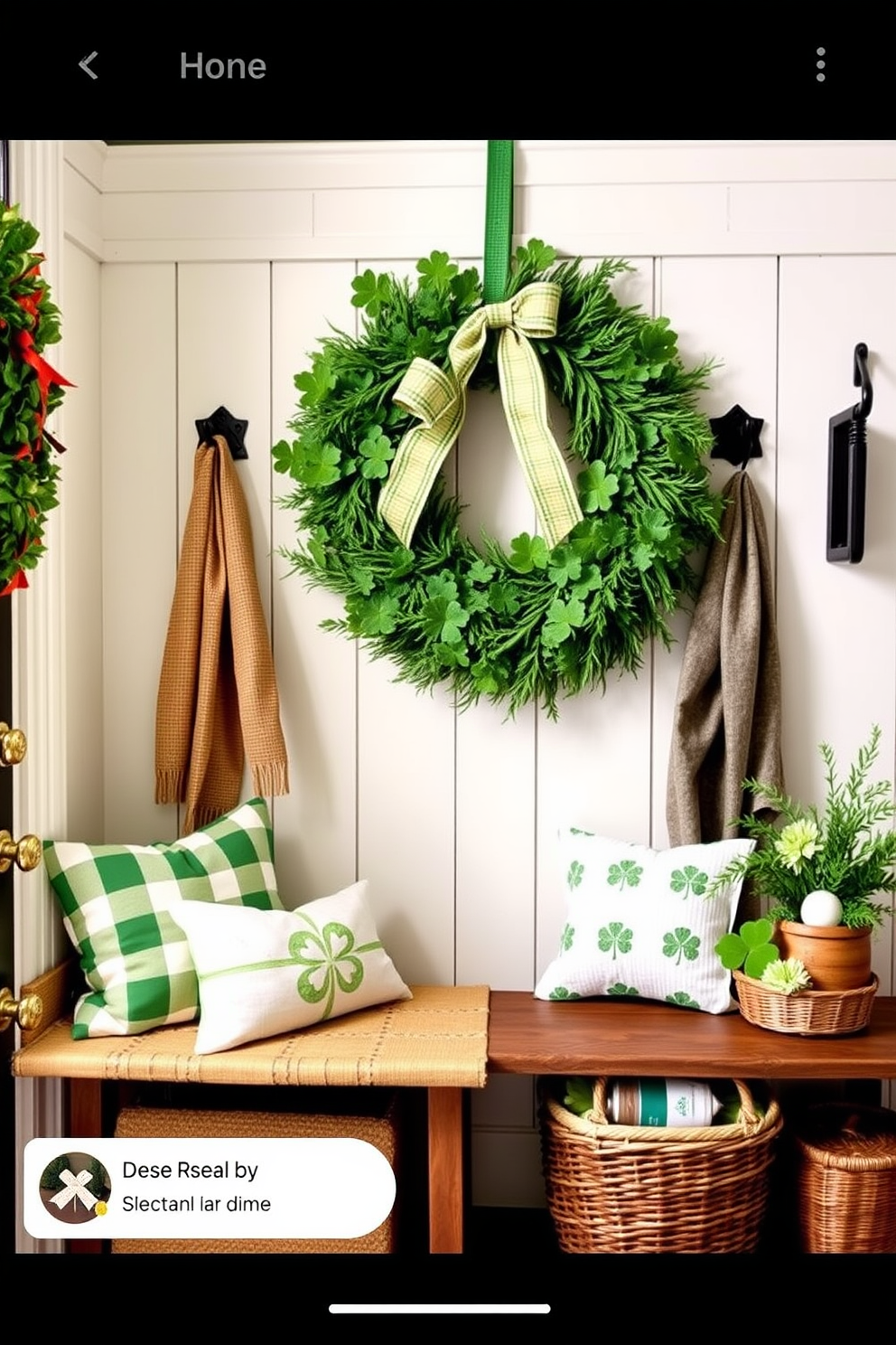 A charming mudroom decorated for St. Patrick's Day features a vibrant green wreath adorned with shamrocks and festive ribbons, welcoming guests with a touch of holiday spirit. The space is enhanced by decorative accents, such as a rustic bench with plush cushions and baskets filled with seasonal decor, creating an inviting and cheerful atmosphere.