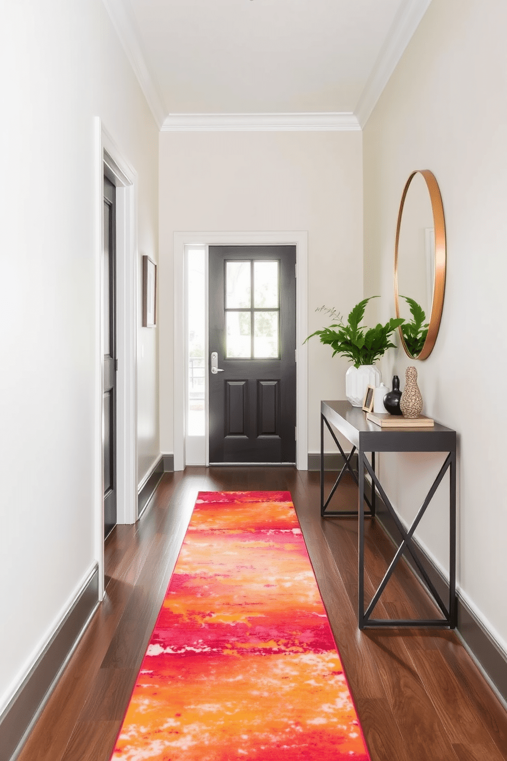 A narrow entryway adorned with a brightly colored runner rug that adds warmth and vibrancy to the space. The walls are painted in a soft neutral tone, complemented by a sleek console table with decorative items and a small potted plant.