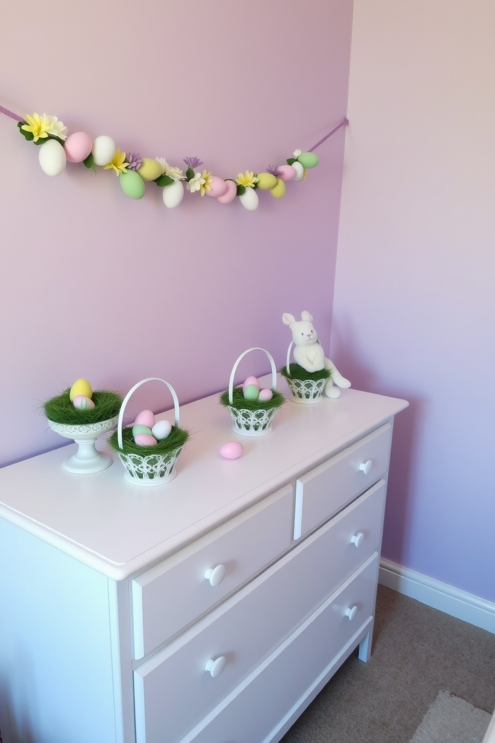 A charming nursery decorated for Easter. A white dresser adorned with pastel-colored decorative egg centerpieces, each nestled in a bed of green moss within small, elegant baskets. The walls are painted a soft lavender, and a plush bunny toy sits beside the centerpieces, adding a touch of whimsy. Above the dresser, a garland of pastel eggs and flowers is draped, enhancing the festive atmosphere.