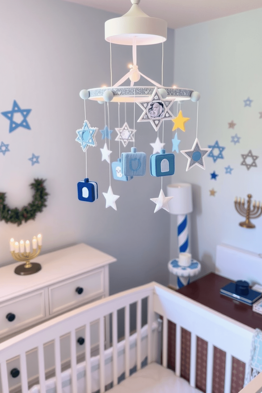 A whimsical Hanukkah-themed baby mobile hangs above a cozy crib, featuring delicate felt dreidels, stars, and menorahs in shades of blue and silver. Soft, twinkling lights illuminate the mobile, creating a serene atmosphere for bedtime. The nursery is adorned with festive Hanukkah decorations, including a plush menorah on the dresser and a cheerful blue and white color scheme. Wall decals of dreidels and stars add a playful touch, making the space inviting and joyful for the holiday season.