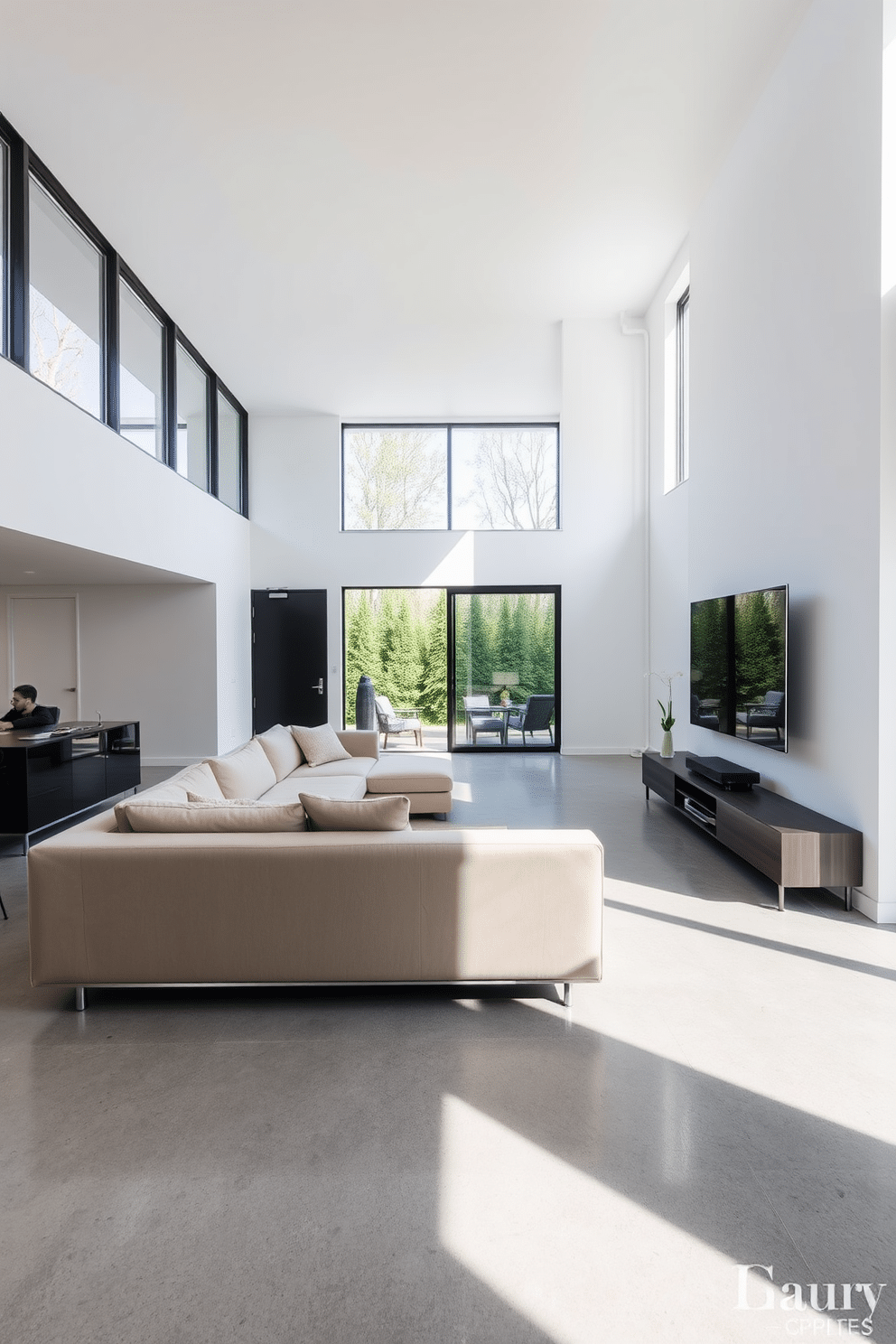 A modern minimalist basement design featuring sleek finishes. The space is open and airy, with large windows allowing natural light to flood in, highlighting the clean lines of the furniture. The walls are painted in a soft white, complemented by a polished concrete floor. A low-profile sectional sofa in a neutral tone faces a minimalist entertainment unit, creating a cozy yet sophisticated atmosphere.