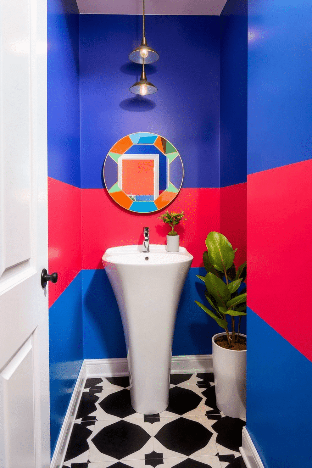 A bold powder room featuring vibrant color blocking, with one wall painted in a rich royal blue and the opposite wall in a striking coral hue. The space includes a sleek white pedestal sink and a round mirror with a colorful geometric frame that complements the wall colors. The floor is adorned with large black and white tiles, creating a dramatic contrast against the bold walls. A small, modern light fixture hangs from the ceiling, providing warm illumination, while a potted plant adds a touch of greenery to the lively atmosphere.