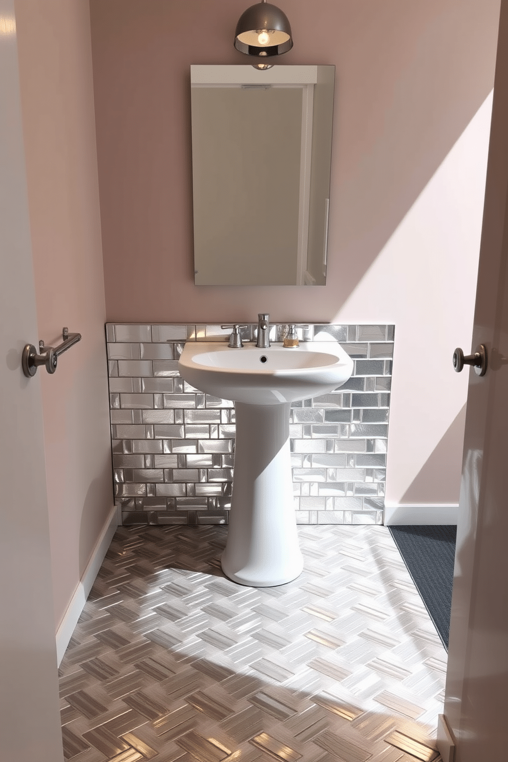 A stylish powder room featuring metallic tiles that reflect light beautifully, creating an elegant ambiance. The walls are adorned in a soft, complementary color, enhancing the chic finish of the space. The floor showcases a stunning geometric pattern made from various metallic tiles, adding depth and interest. A sleek pedestal sink sits atop this dazzling flooring, accompanied by modern fixtures in polished chrome.