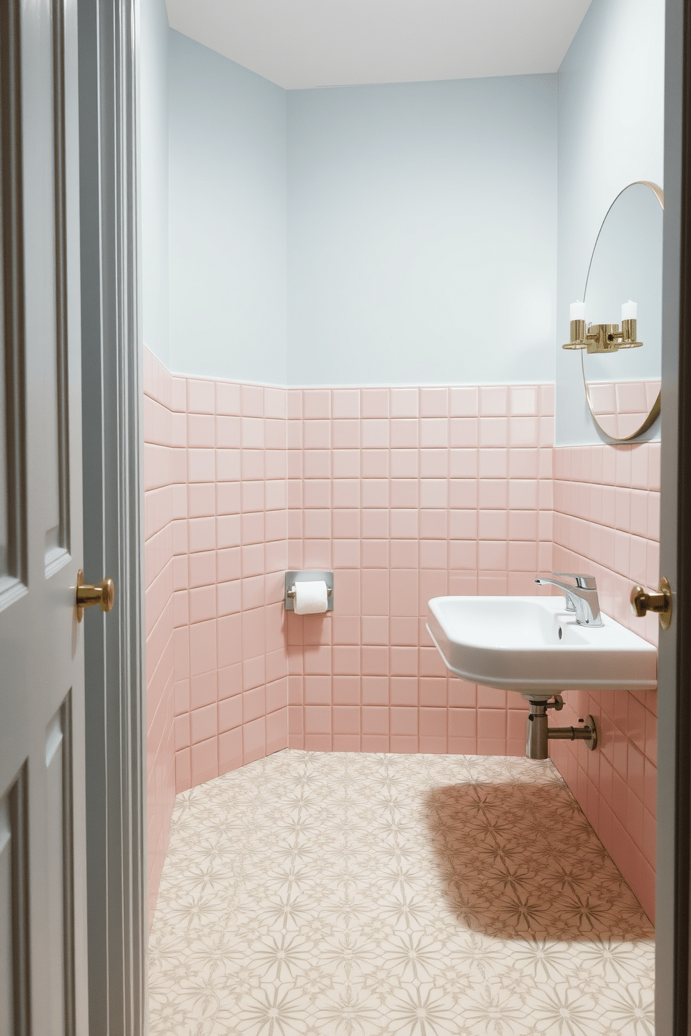 A serene powder room featuring soft pastel tiles in shades of blush pink and pale blue, creating a calming atmosphere. The floor is adorned with a delicate geometric pattern, enhancing the space's tranquil vibe while complementing the light, airy walls.