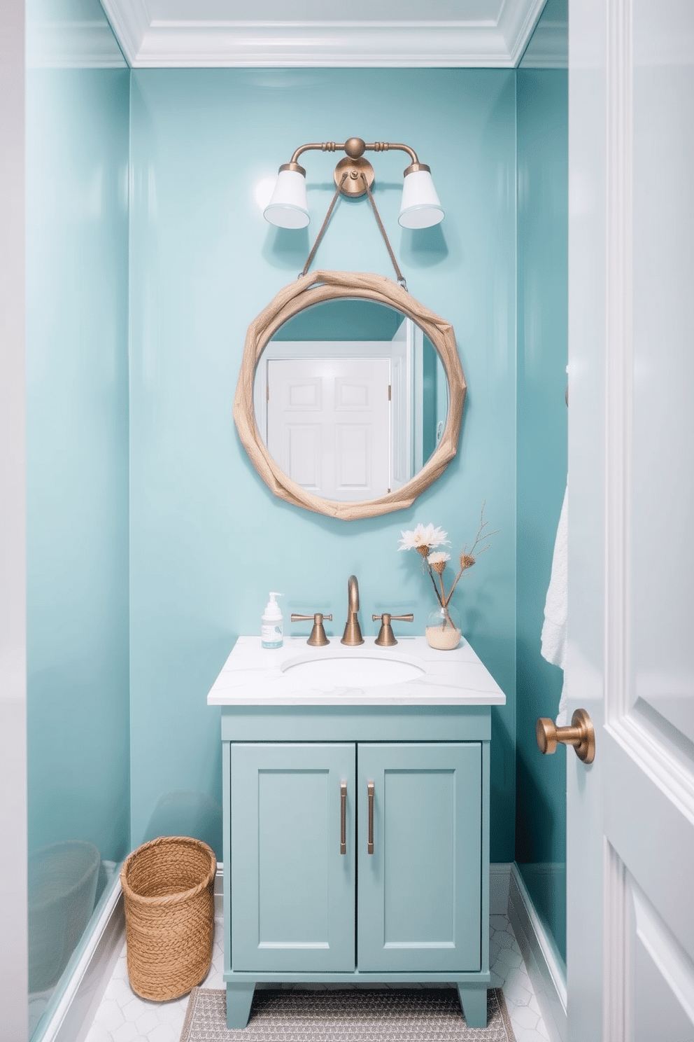 A serene powder room designed in ocean teal, evoking a calming beach escape. The walls are adorned with a soft, glossy finish that reflects light, enhancing the tranquil atmosphere. A chic vanity features a white marble countertop complemented by brushed nickel fixtures. Above, a stylish round mirror framed in driftwood adds a natural touch, while coastal-themed decor accents the space.