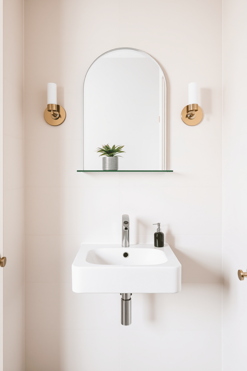 A sleek wall-mounted sink creates a minimalist aesthetic, featuring clean lines and a streamlined silhouette. The surrounding space is adorned with neutral-toned tiles and a simple, elegant mirror that enhances the airy feel of the powder room. Incorporate a small shelf above the sink for decorative items like a potted plant or stylish soap dispenser. Soft lighting fixtures, such as sconces, frame the mirror, adding warmth and sophistication to the overall design.