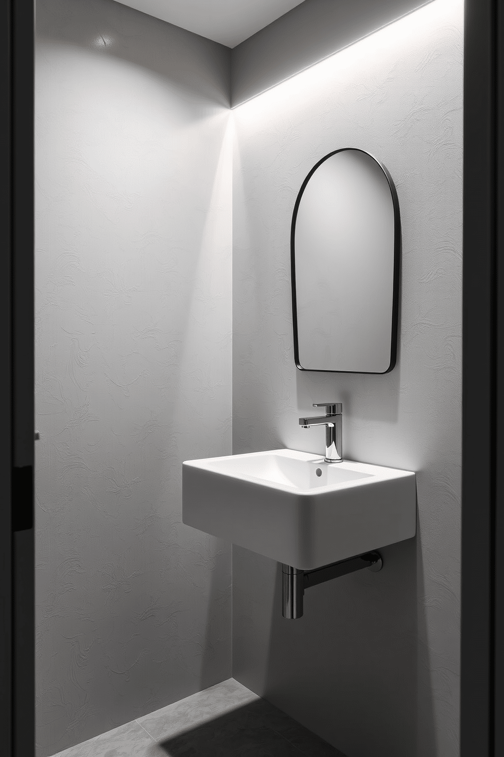 A sleek floating sink is mounted against a textured wall, complemented by an elegant wall mirror with a thin black frame. The powder room features soft ambient lighting that highlights the minimalist design, creating a sophisticated and inviting atmosphere.