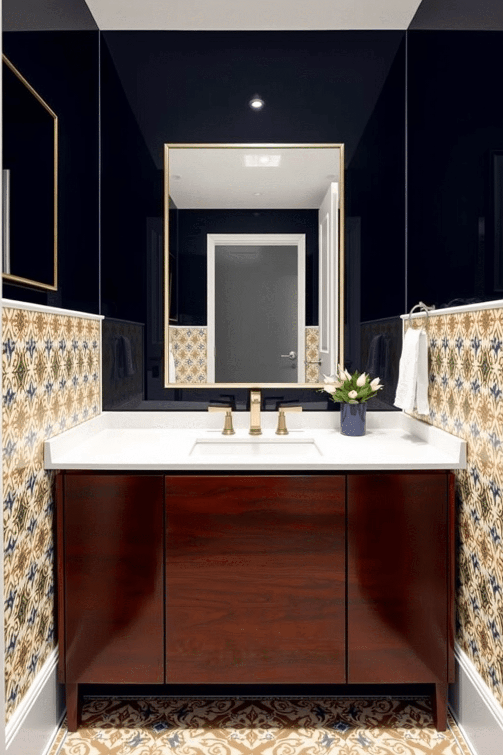 A chic powder room featuring bold patterned tiles behind the vanity, creating a striking focal point. The vanity is a sleek, modern design with a deep, rich wood finish and a polished white countertop that complements the vibrant tiles.