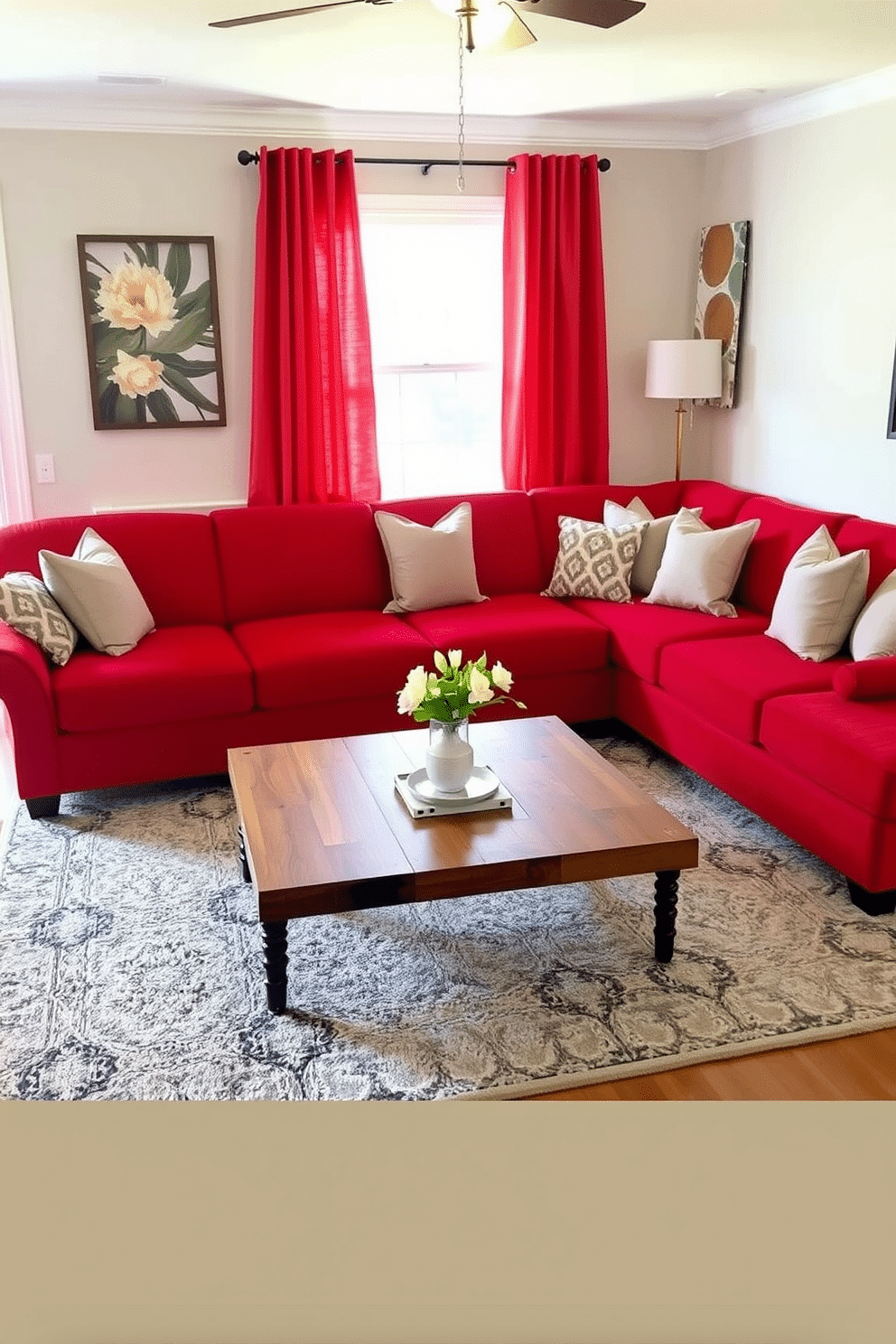 A vibrant family room featuring a red sectional sofa adorned with neutral accent pillows. The space is complemented by a light gray area rug and a sleek coffee table made of reclaimed wood, creating a cozy yet stylish atmosphere.