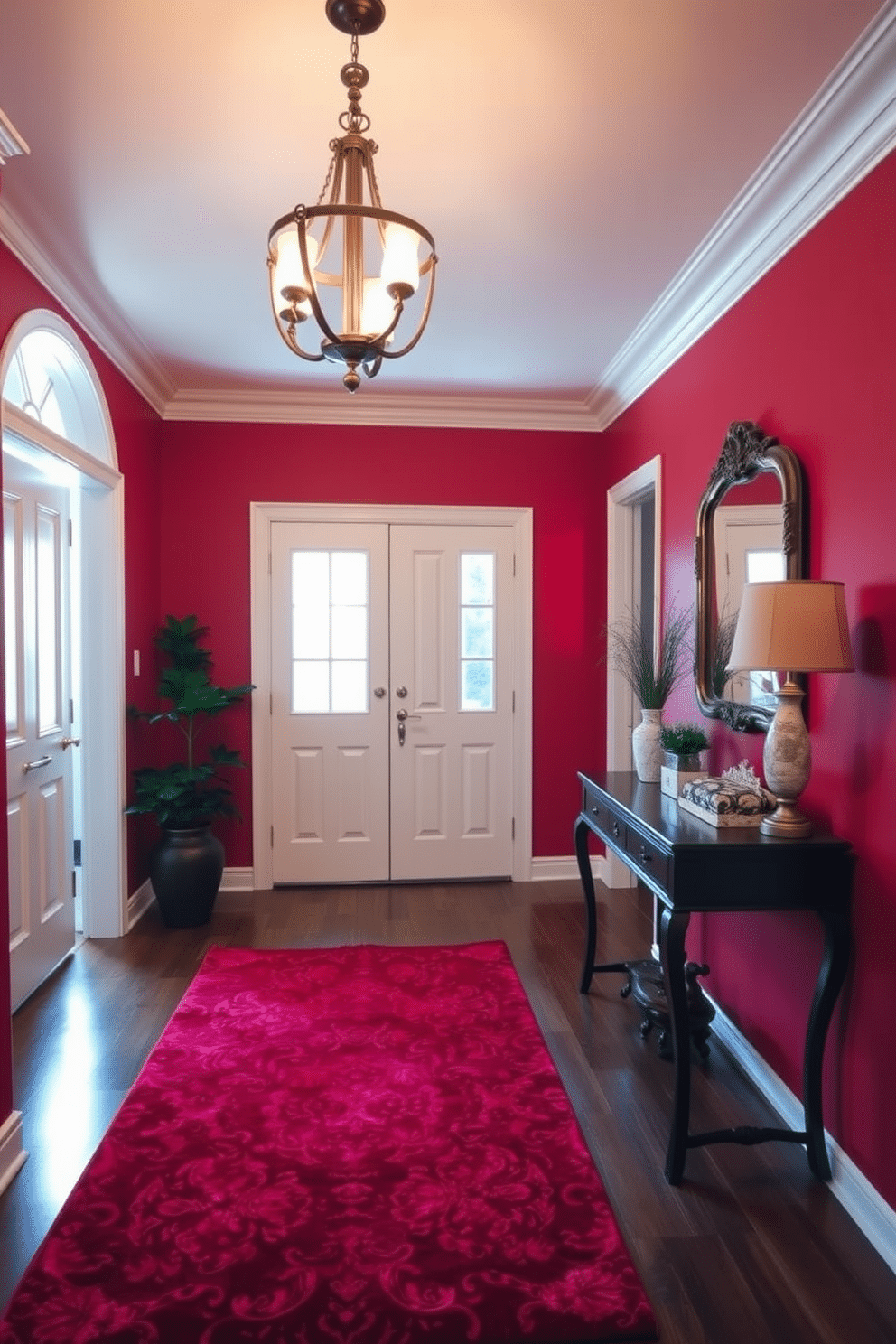 A cozy foyer painted in a rich red hue, featuring a plush area rug that adds warmth underfoot. Soft, ambient lighting from a stylish chandelier casts a welcoming glow, highlighting the elegant details of the space. An inviting console table sits against the wall, adorned with decorative items and a mirror that reflects the light. Potted plants in the corners bring a touch of nature indoors, enhancing the overall charm of the foyer.