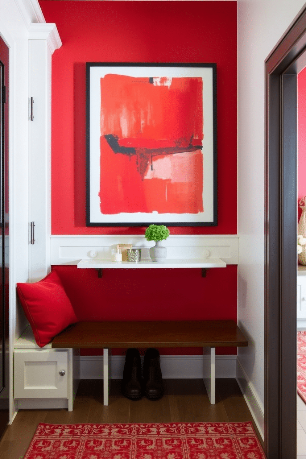 Charming red wall art for personality. A vibrant abstract painting in shades of red and orange adds a bold focal point to the room, complemented by sleek black frames. The artwork is hung above a modern console table, adorned with decorative objects and a small potted plant for a touch of greenery. Red Mudroom Design Ideas. The mudroom features a rich red accent wall, creating an inviting atmosphere, with built-in benches and hooks for storage. Light-colored cabinetry contrasts beautifully with the red, while a patterned rug adds warmth and texture to the space.