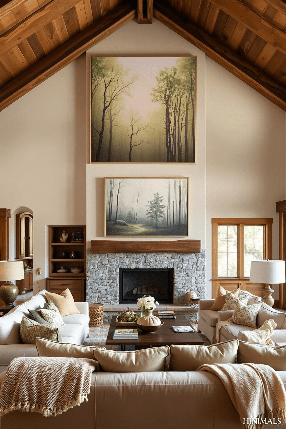 Nature-inspired artwork for serene ambiance. A large canvas featuring a tranquil forest scene hangs above a light-colored sofa, creating a calming focal point. Soft, earthy tones dominate the color palette, complemented by natural wood accents throughout the space. Rustic Family Room Design Ideas. Exposed wooden beams stretch across the ceiling, while a stone fireplace serves as the room's centerpiece. Plush, oversized furniture invites relaxation, and warm, layered textiles add comfort and charm.