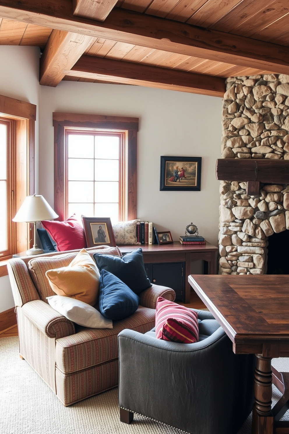 Cozy reading nook with plush cushions. A corner window allows natural light to flood the space, highlighting a collection of colorful, oversized cushions scattered on a deep, comfortable armchair. Rustic home office design ideas. The room features reclaimed wood beams on the ceiling, a sturdy wooden desk with a vintage finish, and a cozy armchair nestled in front of a stone fireplace.