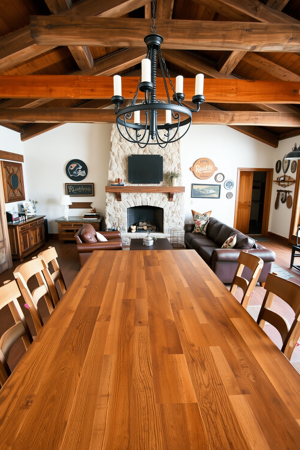 A farmhouse-style dining table for gatherings. The table is made of reclaimed wood, featuring a distressed finish with a natural grain. Surrounding it are mismatched chairs, each with a unique design, creating an inviting atmosphere. Above the table hangs a wrought iron chandelier, casting a warm glow over the space. Rustic man cave design ideas. The room features exposed wooden beams and a stone fireplace as the focal point. A large leather sectional sofa is placed in front of the fireplace, accompanied by a reclaimed wood coffee table. Vintage sports memorabilia adorns the walls, adding character and a personal touch to the cozy retreat.